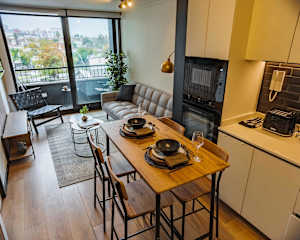 1BR | Cozy Ñuñoa Apt: Balcony & Modern Comforts