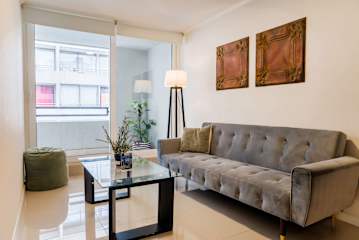 Santiago: 1BR Apartment with Balcony and Views