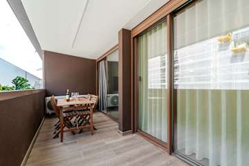 Premium Living with Balcony & Garage by HostWise photo 2