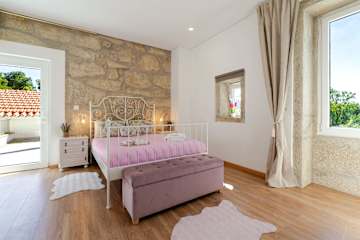 Stone Walls & Sunlit Terrace Retreat by HostWise photo 3