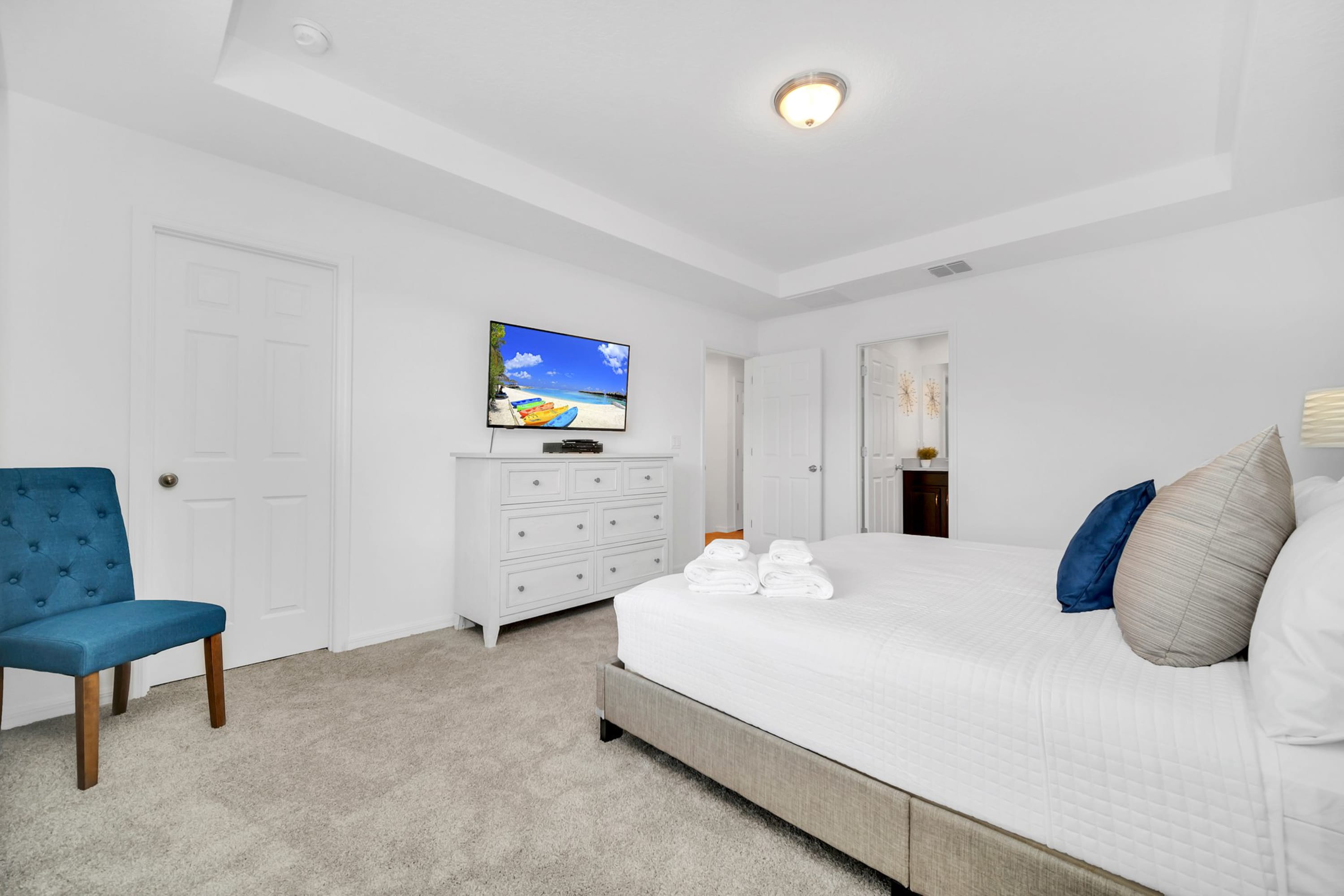 Elegant King Bedroom With Modern Furnishings And Smart TV