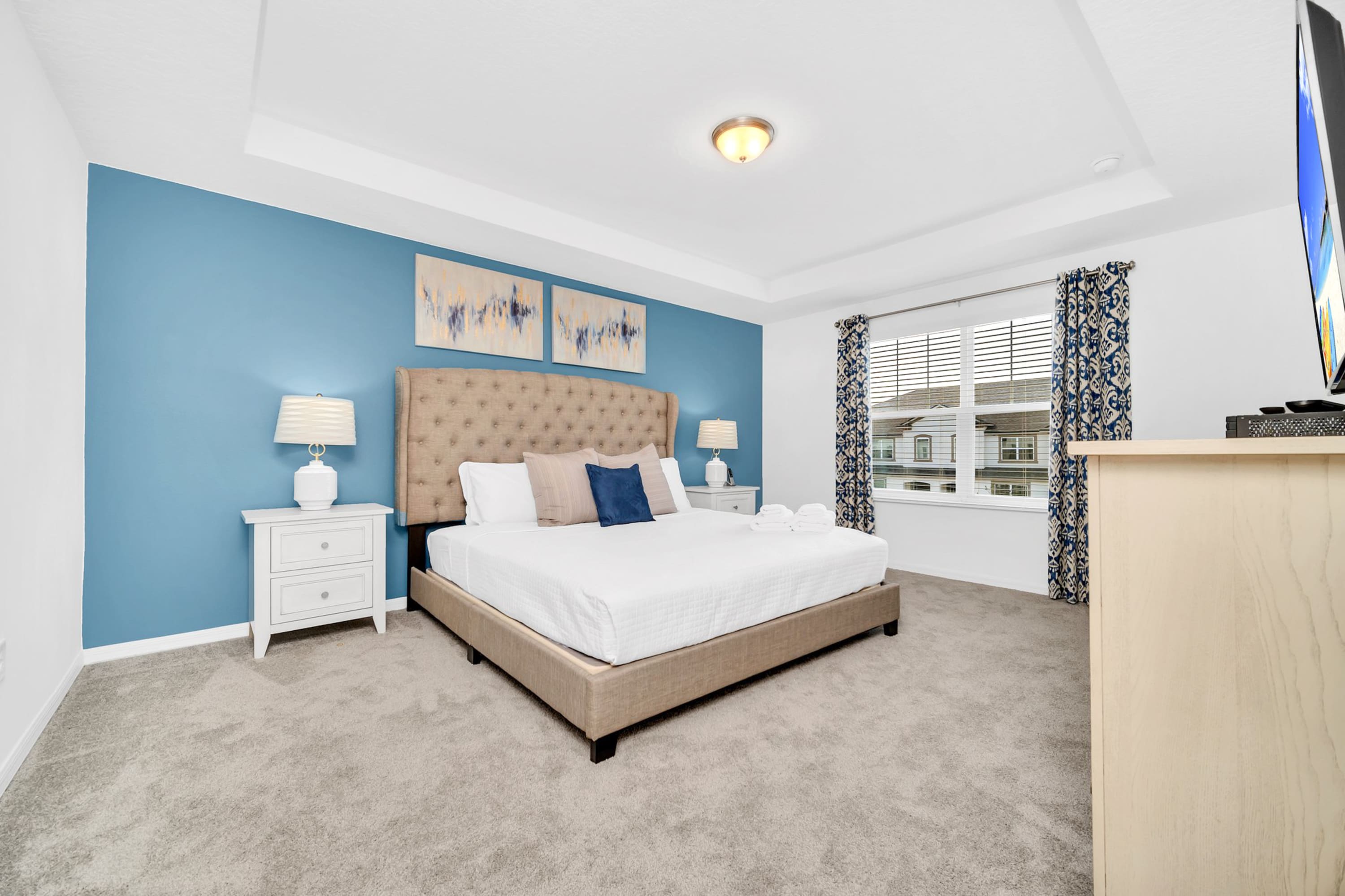 Spacious King Bedroom With Elegant Blue Decor