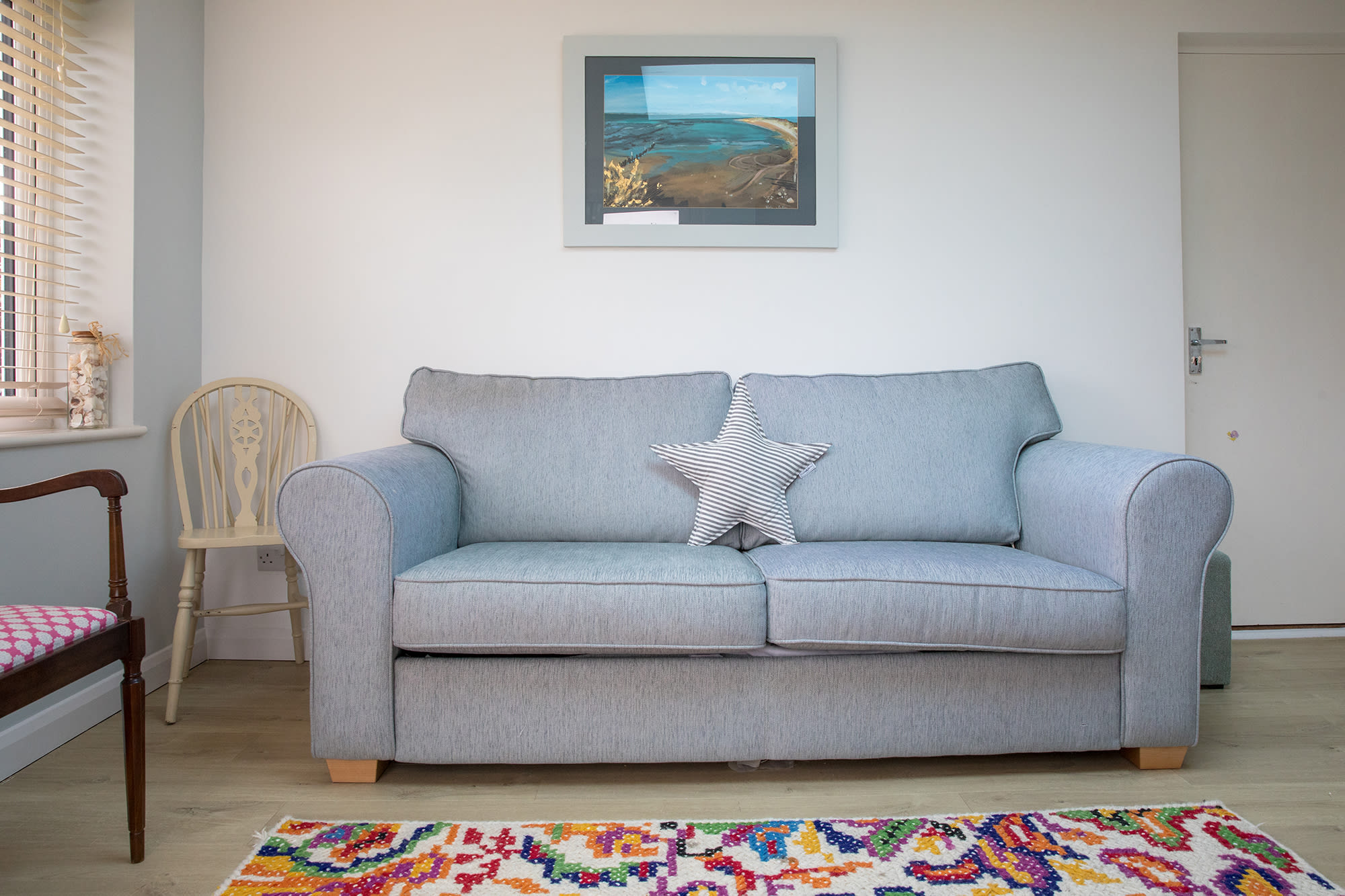 This lovely sofa is placed within the play area