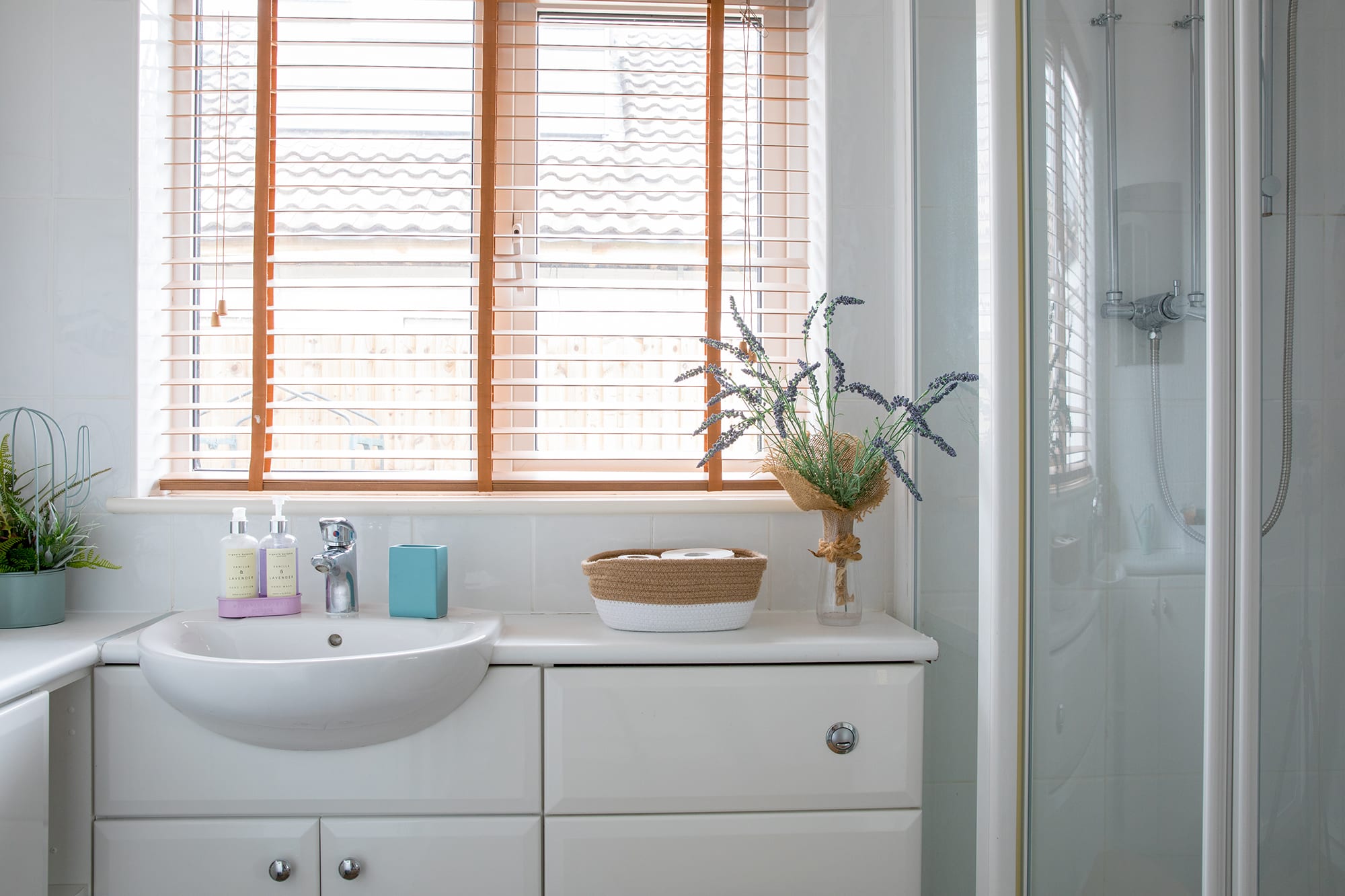 Ground floor king bedroom provides direct access to its ensuite bathroom.