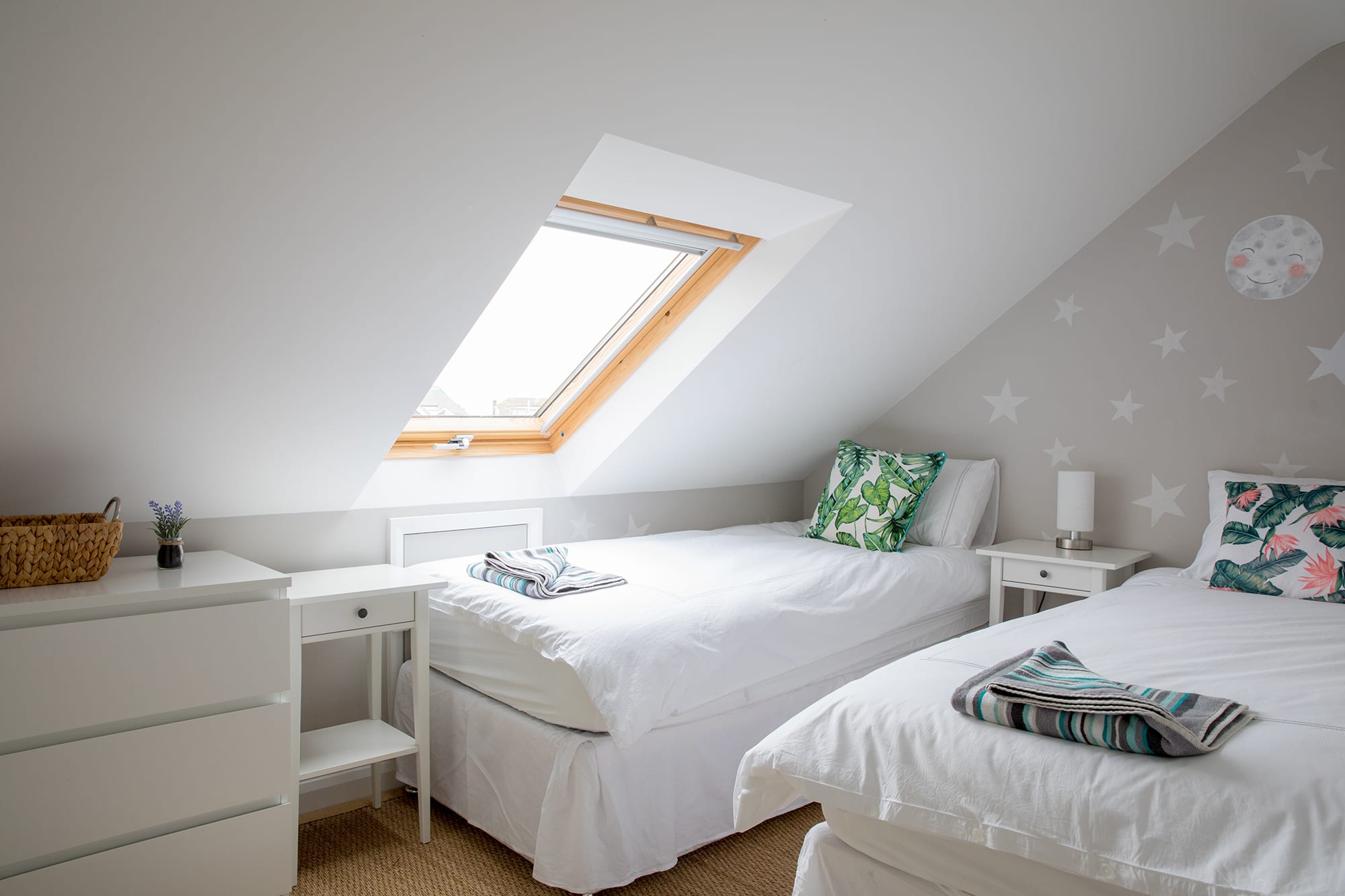 Comfy twin beds can be found in this bedroom.