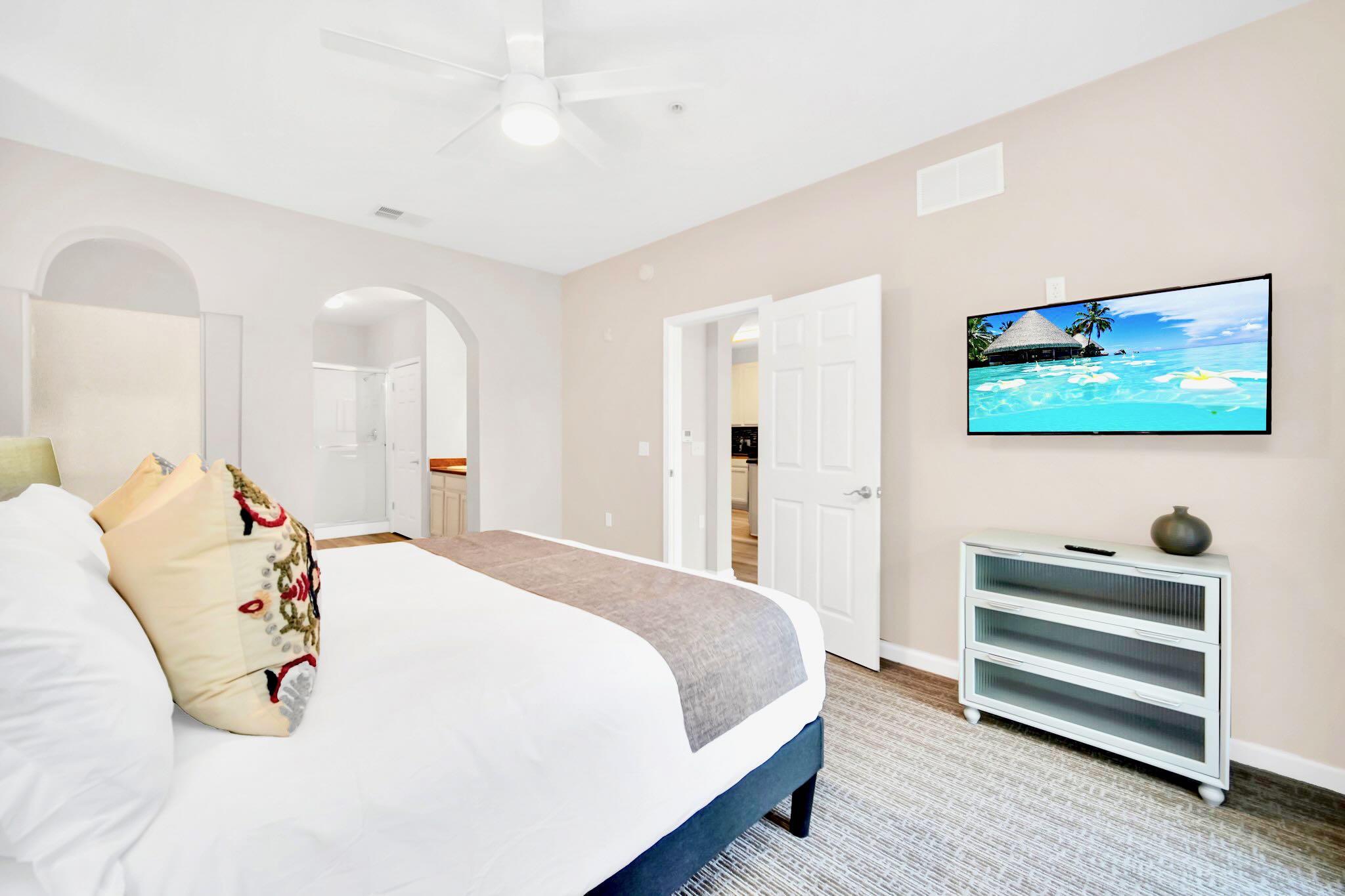 Luxurious Master Bedroom With A Comfortable King Bed And Smart TV