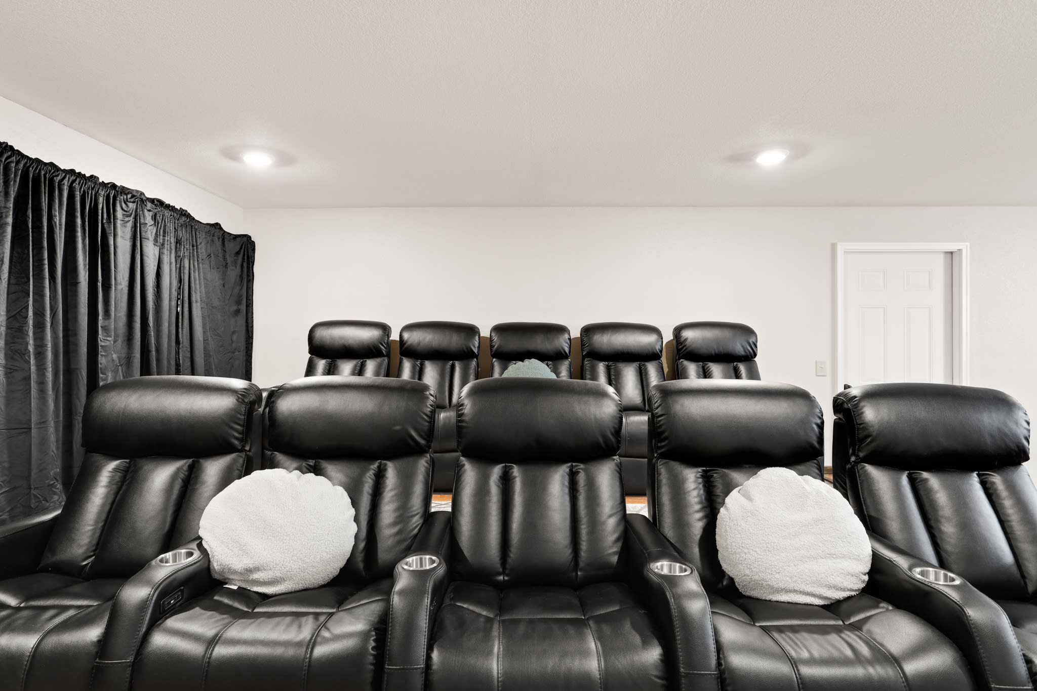 10 reclining movie theater seats in our theater/game room!