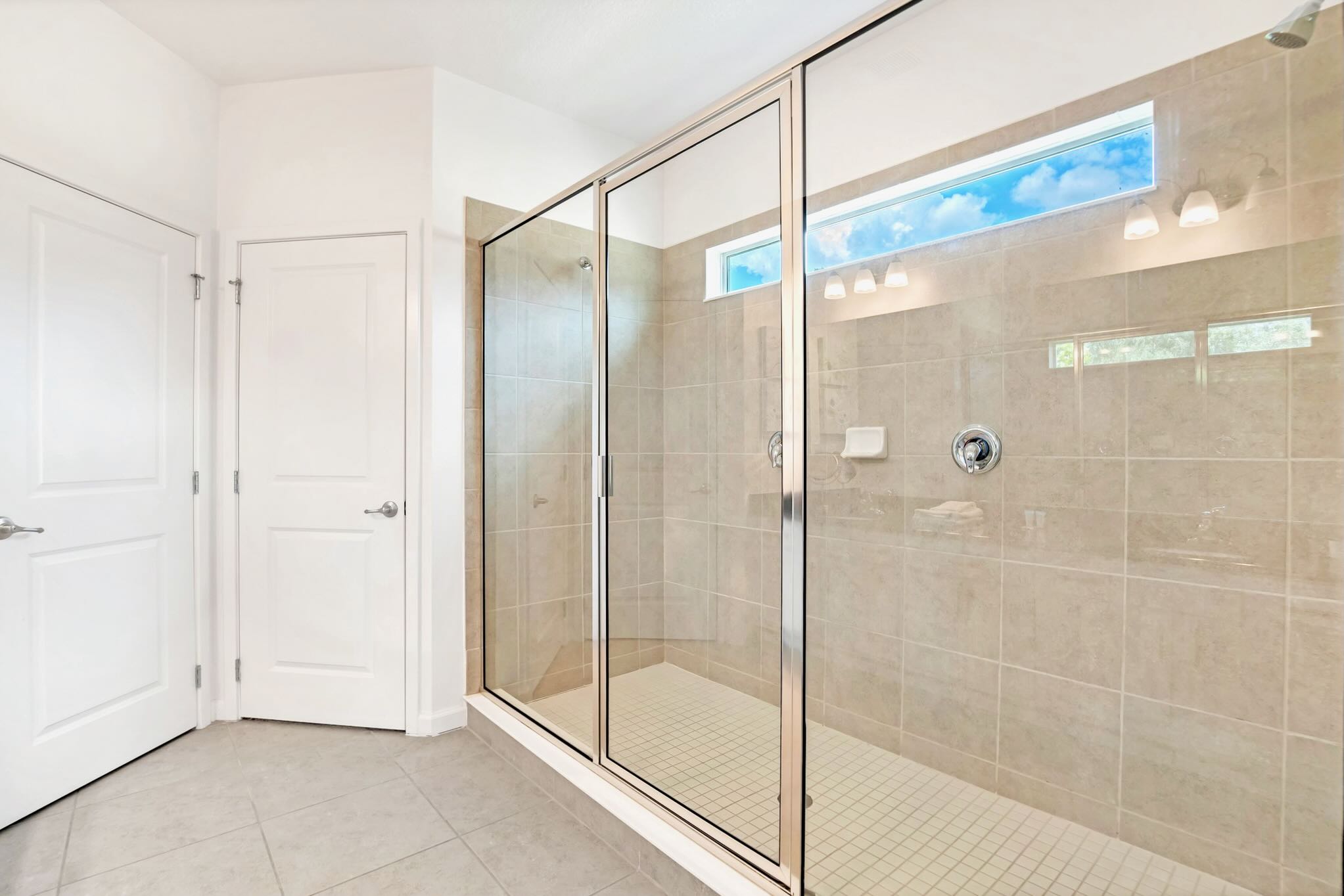 Spacious Walk-In Shower With Glass Enclosure