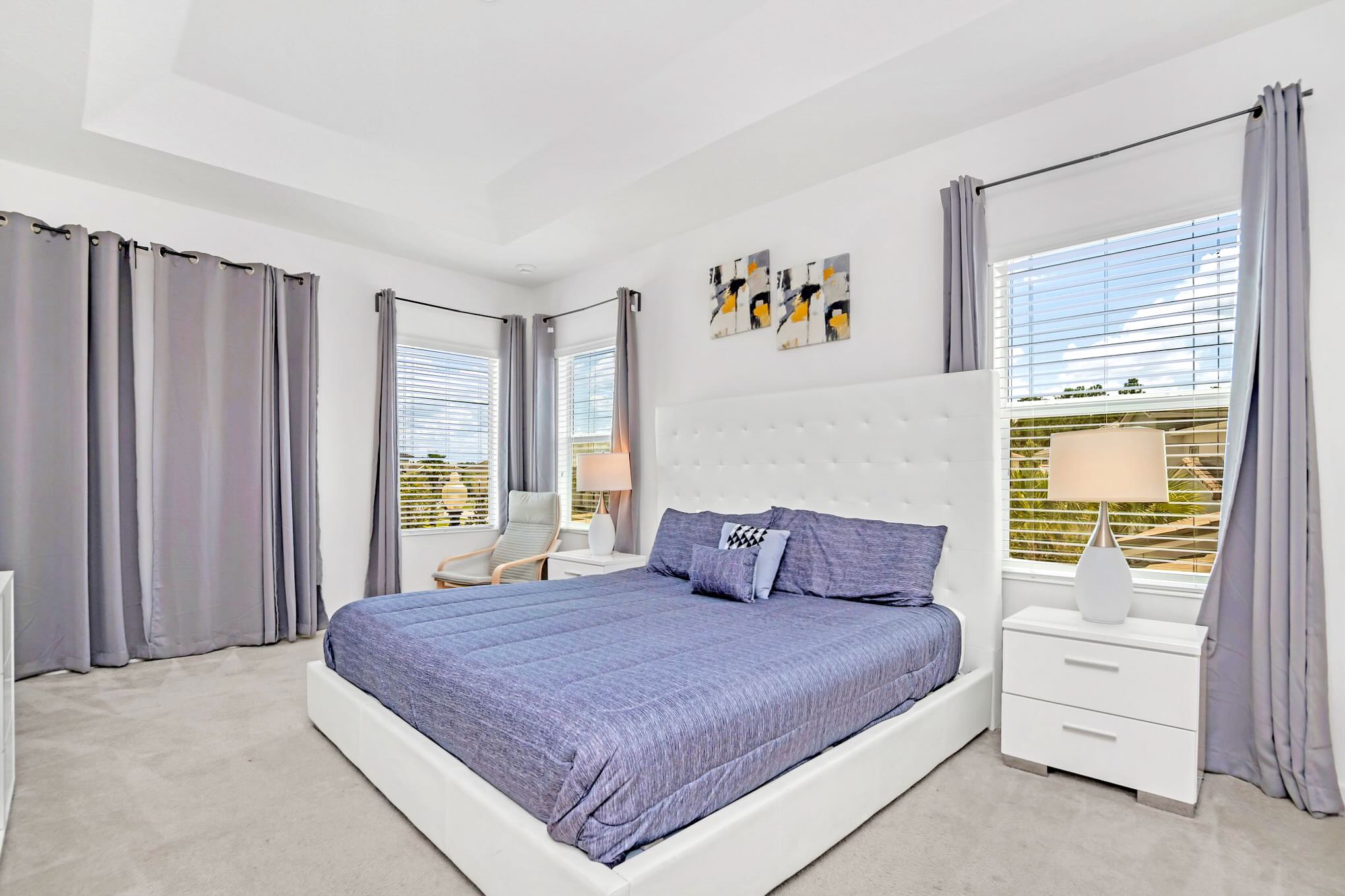 Serene Bedroom With King Bed And Natural Light