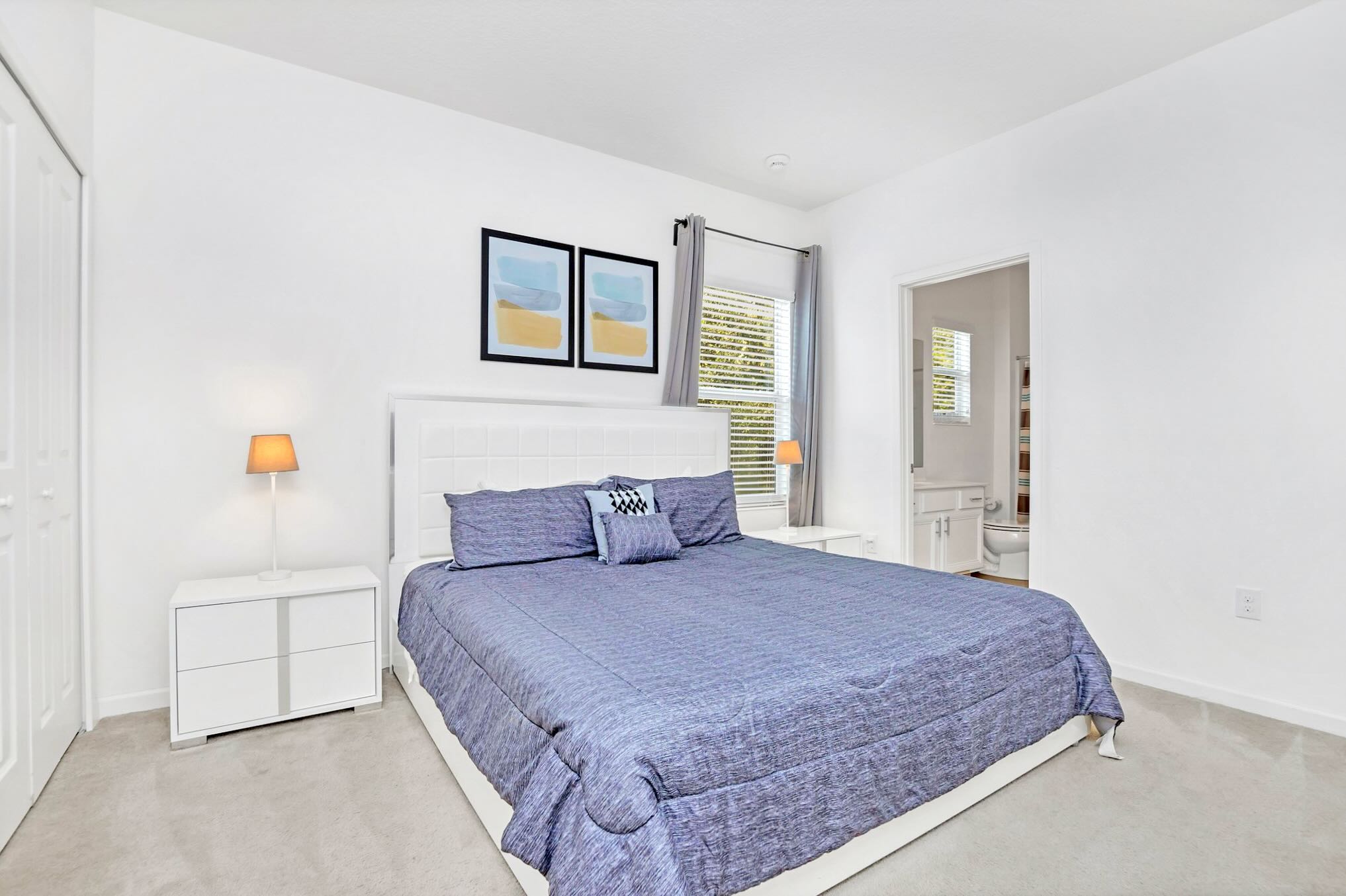 Serene Bedroom With King Bed And Natural Light