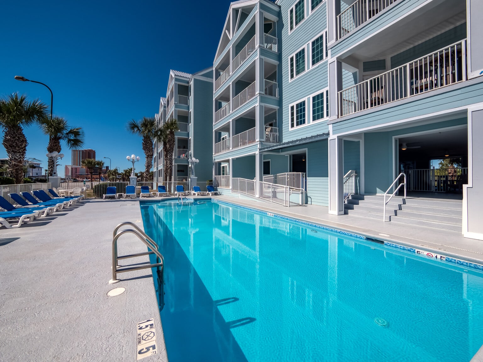 Attractive condo pool across from beach access | Photo 3