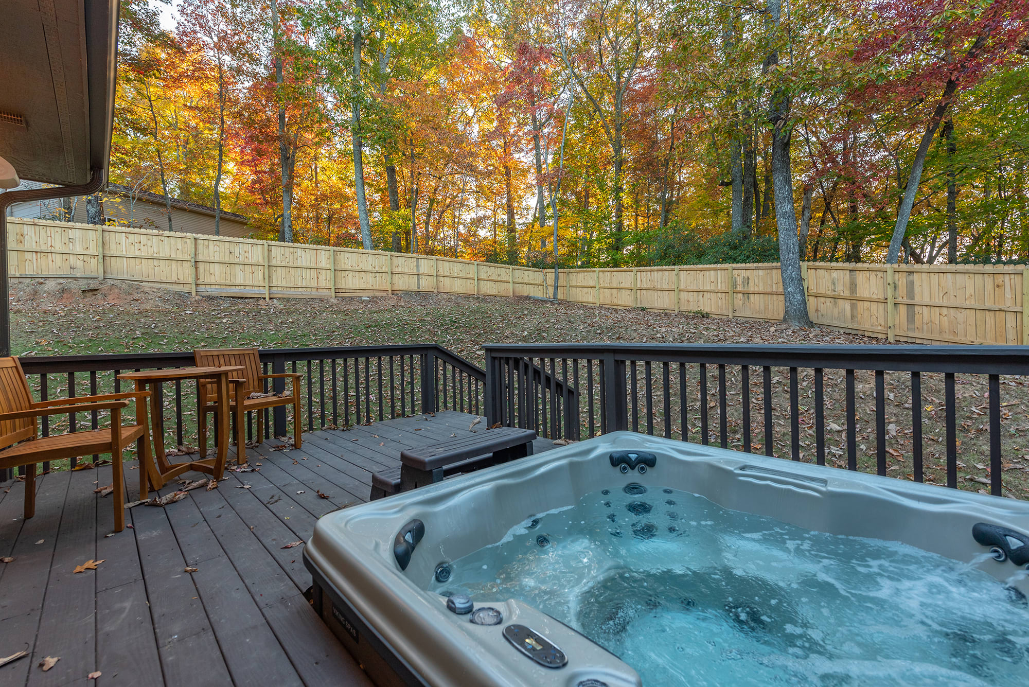 Relax in the hot tub with a fully fenced in yard!