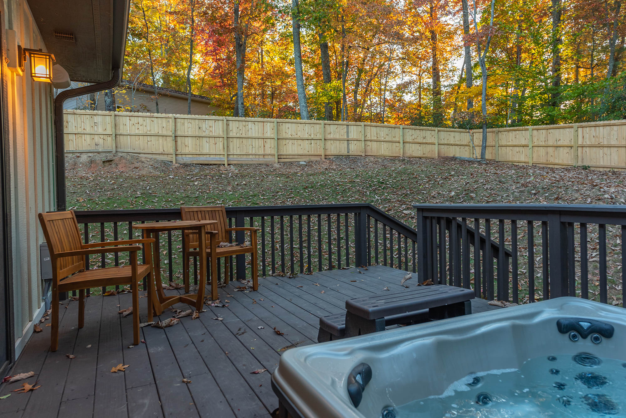 Relax in the hot tub with a fully fenced in yard!