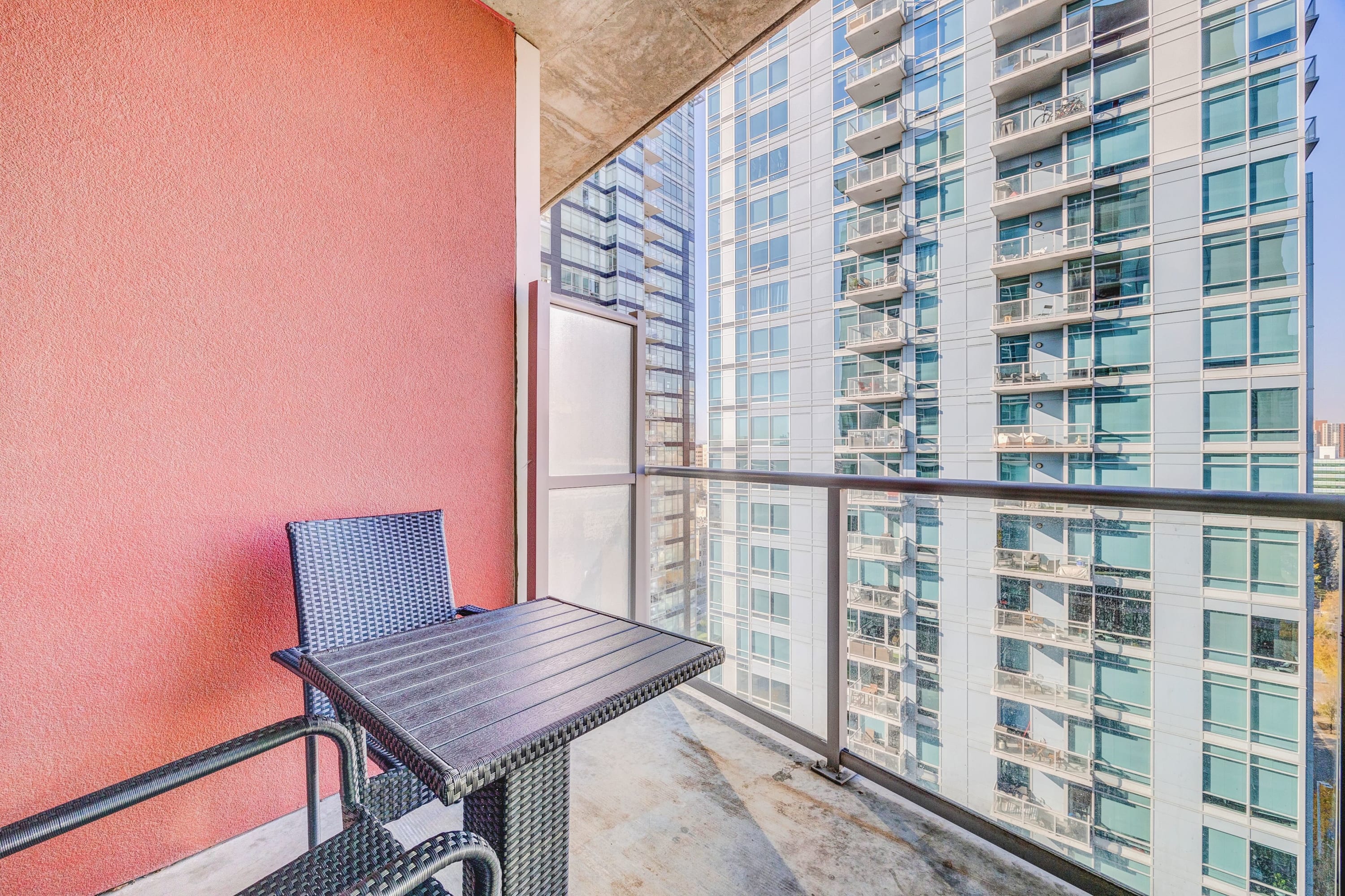 Private outdoor balcony patio with furniture