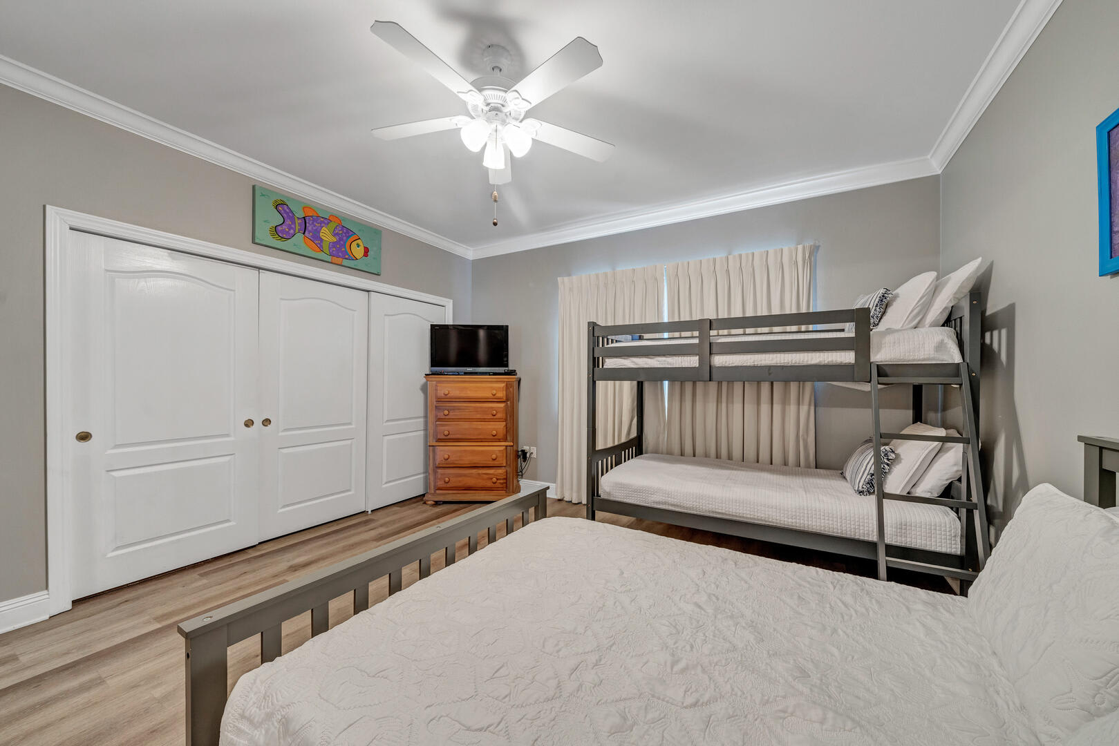 Family friendly room with full size bed and twin bunk bed
