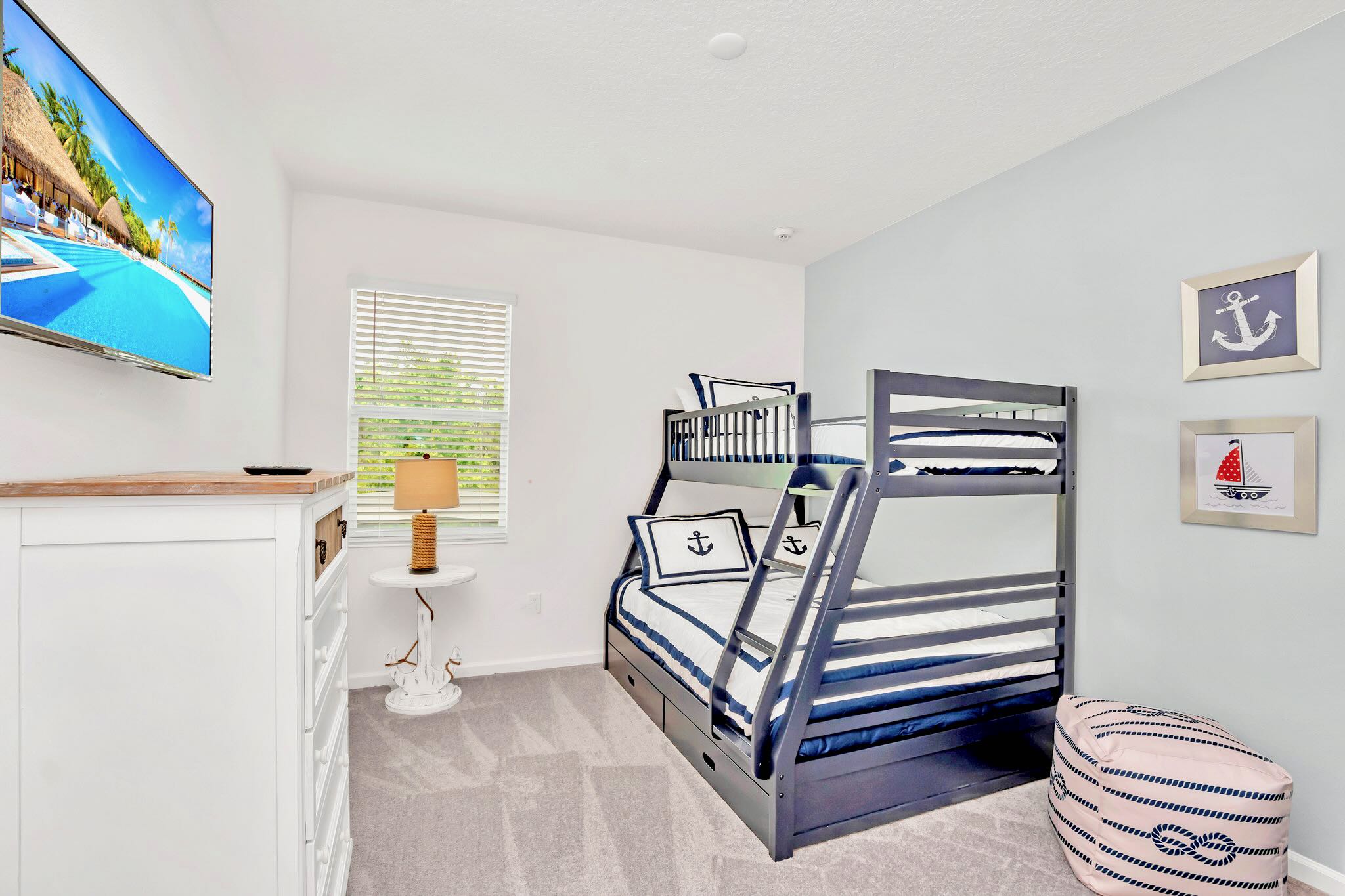 Fun And Playful Room With Modern Bunk Beds, Charming Nautical Decor, And Cozy Atmosphere