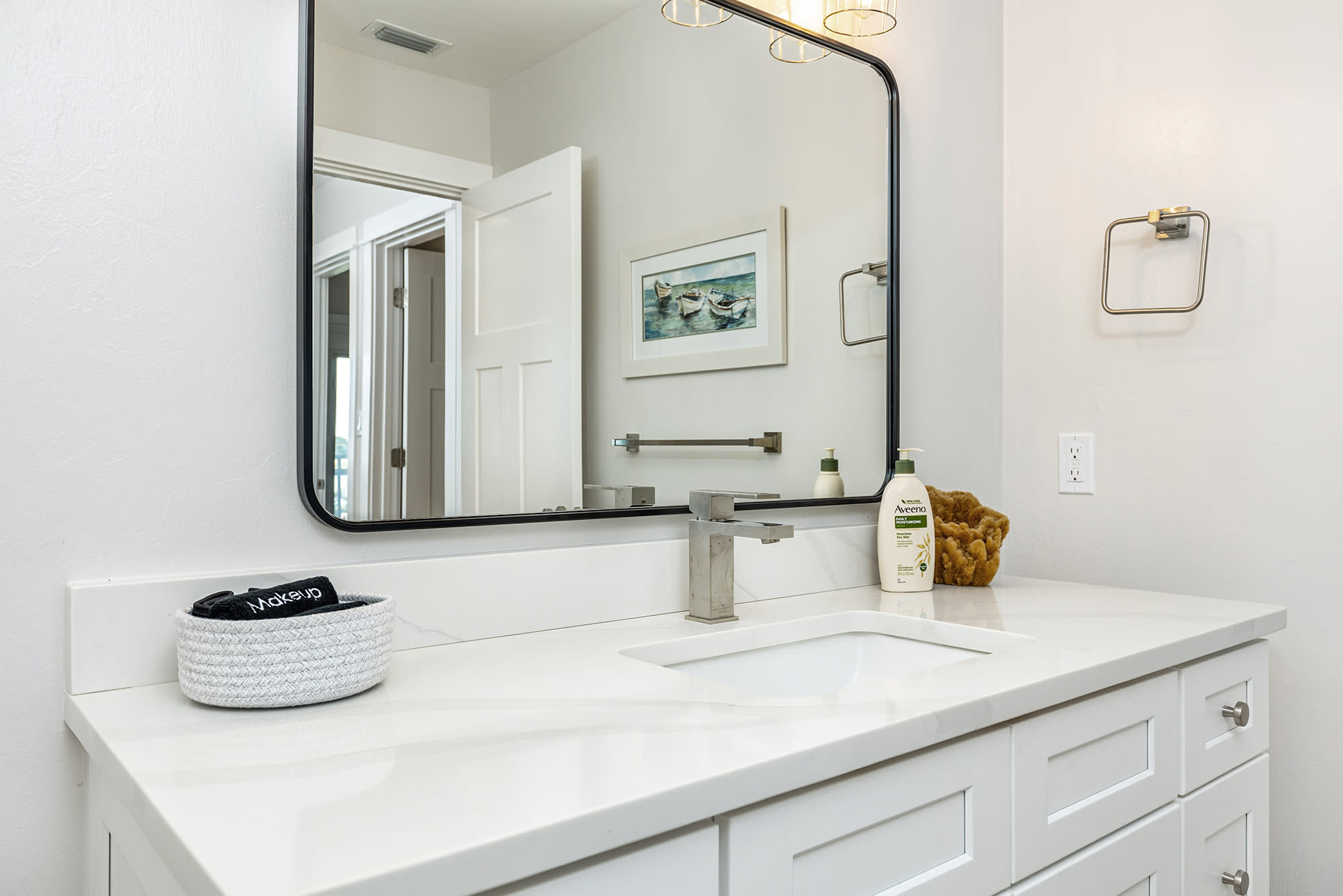 Wide mirror and spacious sink countertop