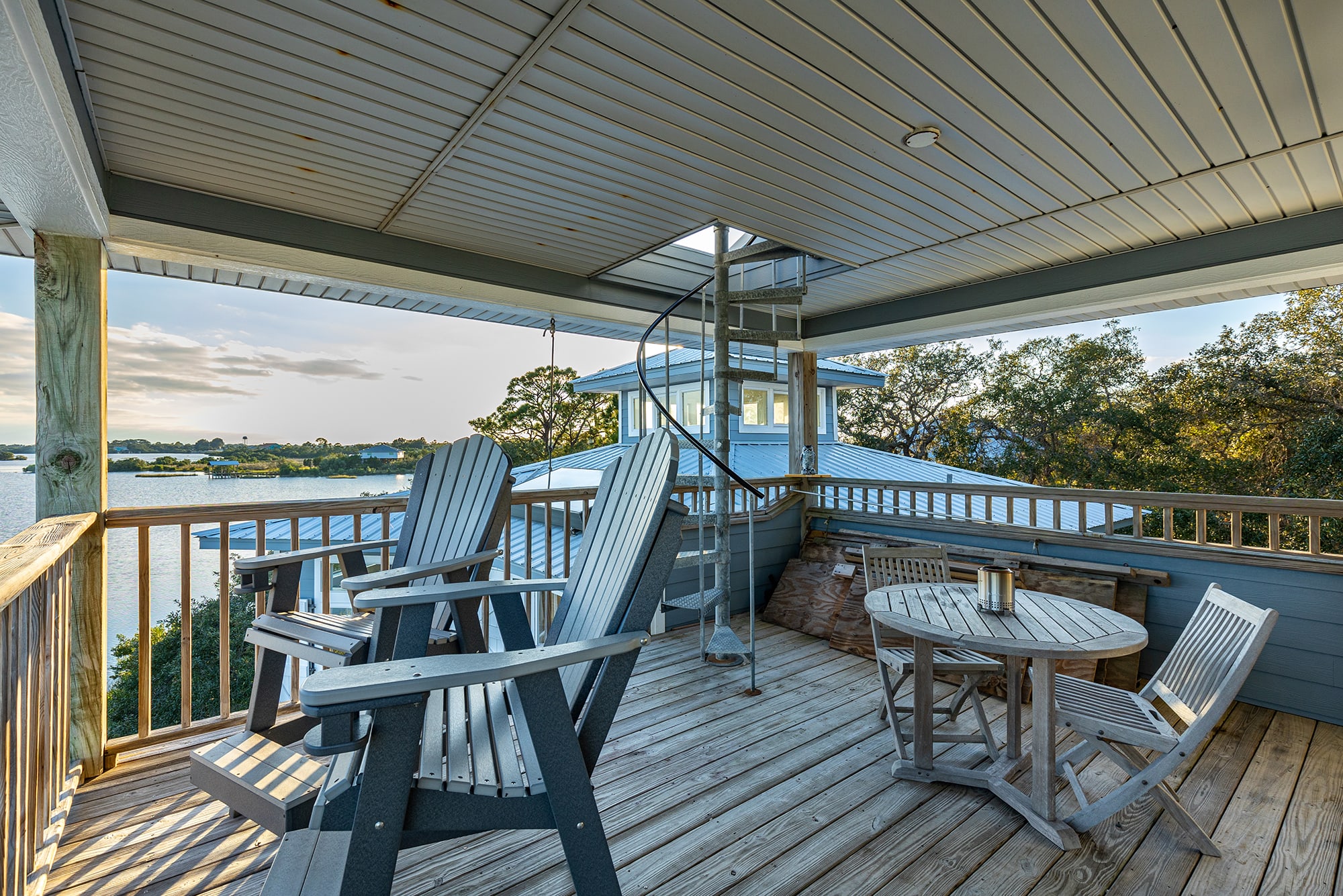 Deck view with spiral staircase to bird's eye view of the island