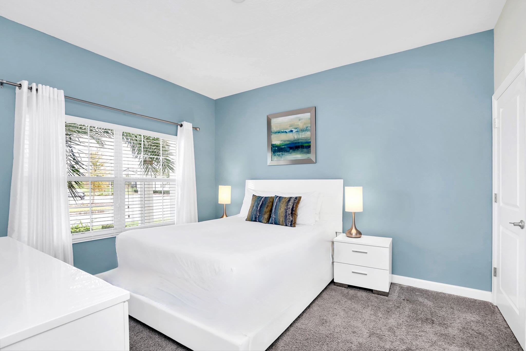 Peaceful Queen Bedroom With Elegant Blue Accents