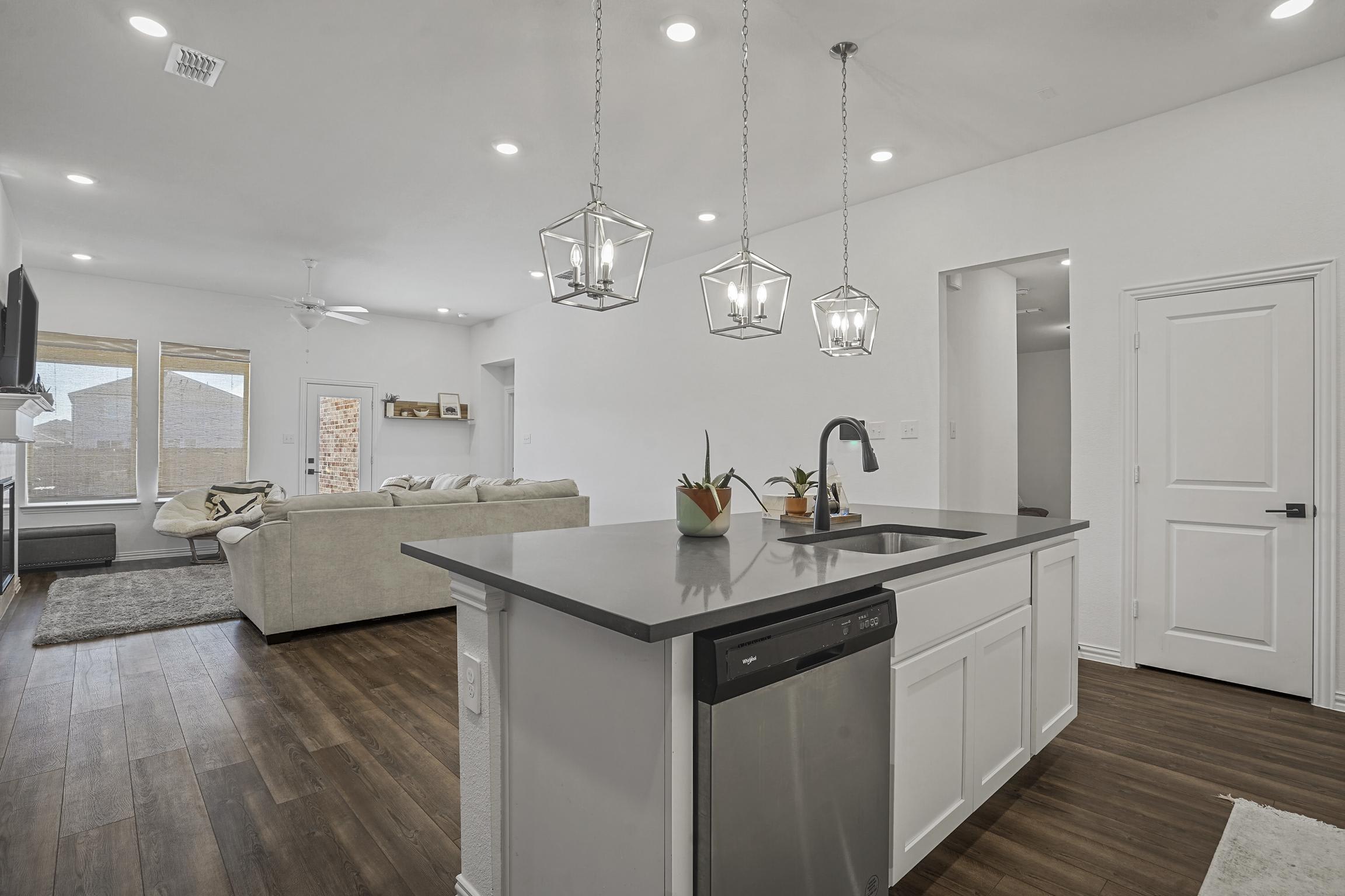 Modern open concept kitchen ready for your stay!