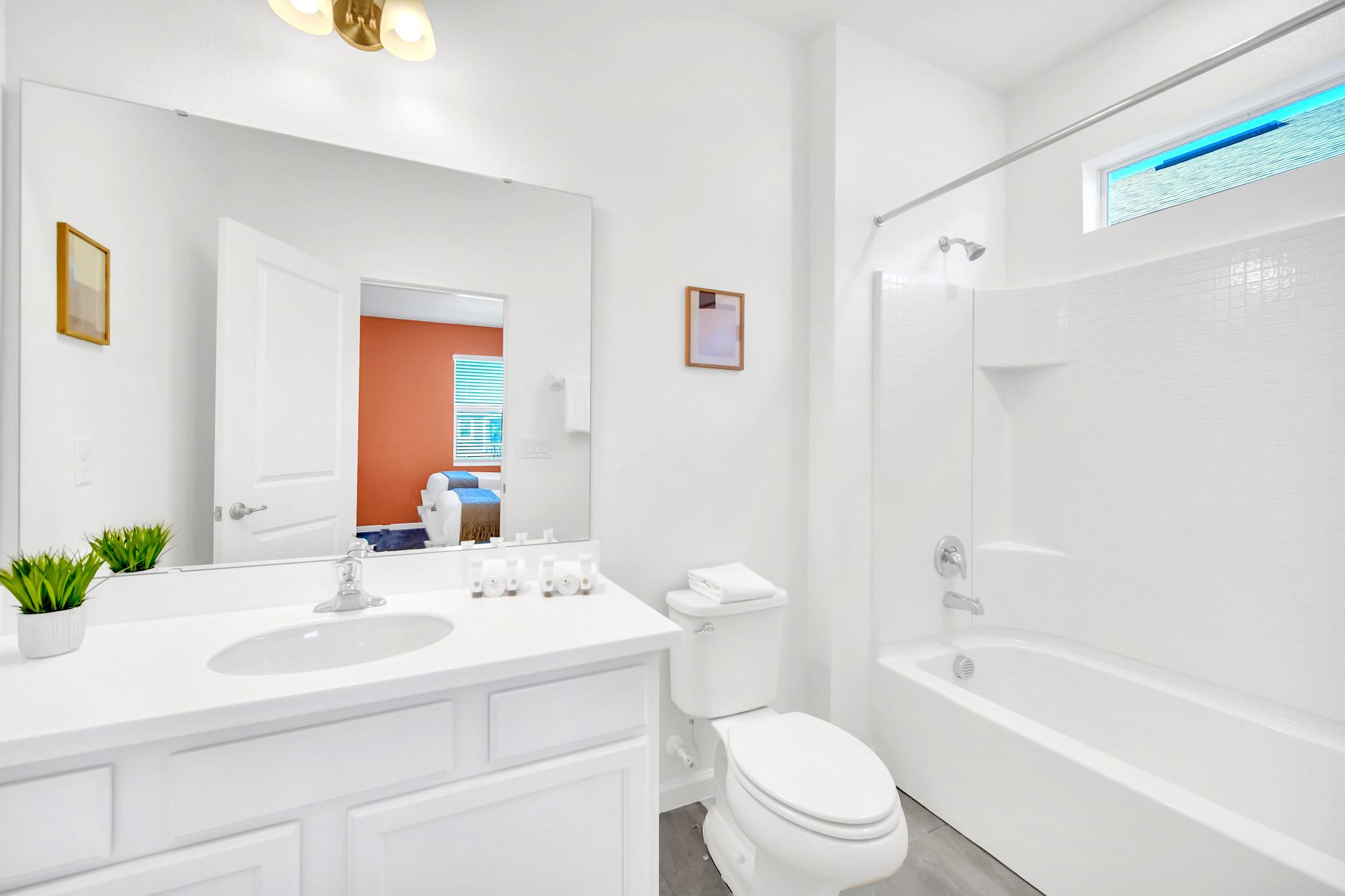 Modern Bathroom With Sleek Fixtures And Ample Counter Space