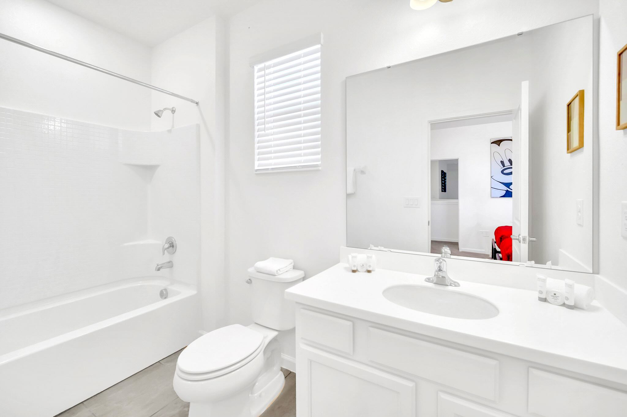 Well-Equipped Bathroom Designed For Convenience And Comfort