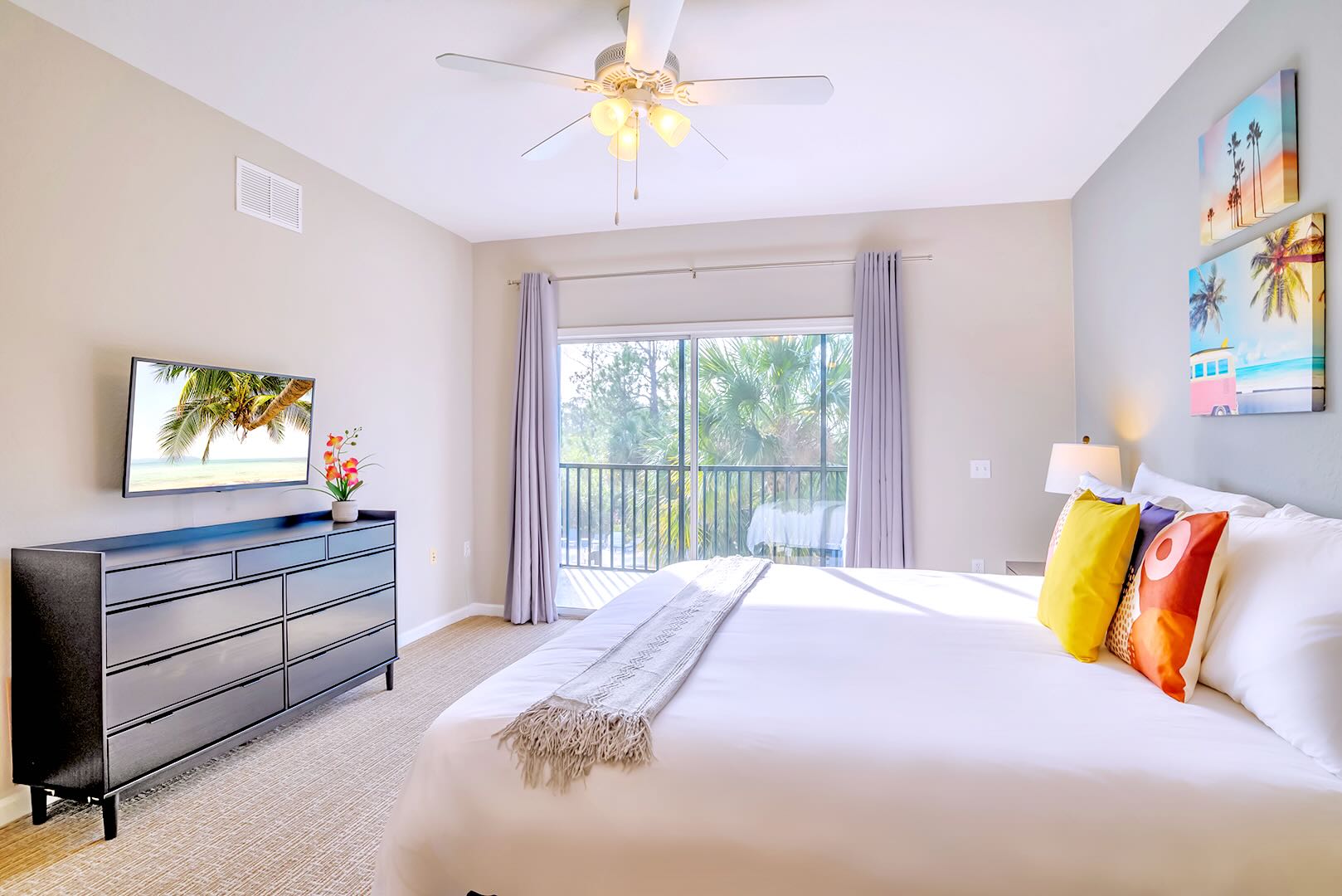 Inviting Master Bedroom With Colorful Decor And Ample Natural Light