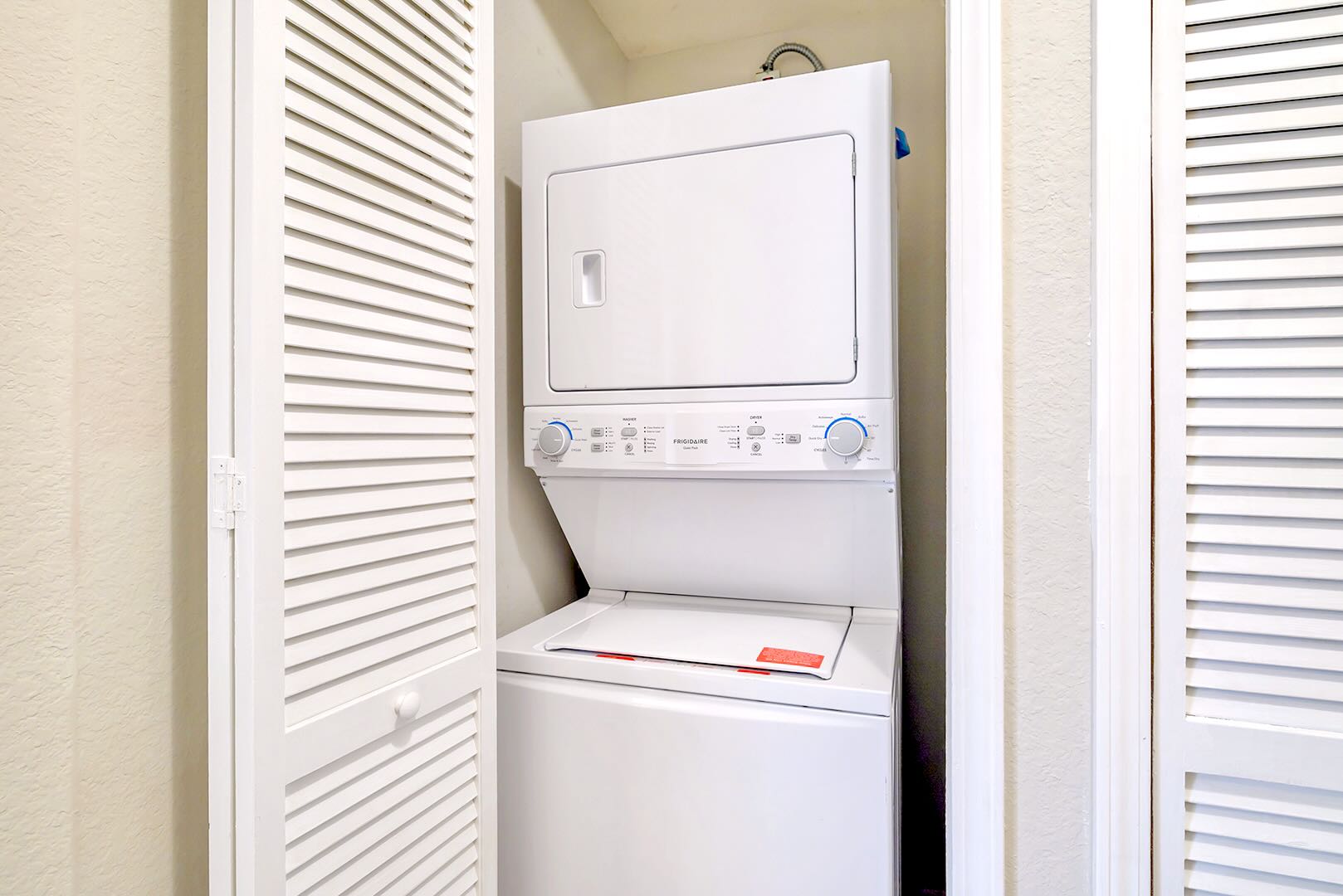 Convenient In-Suite Laundry Room With Modern Washer And Dryer