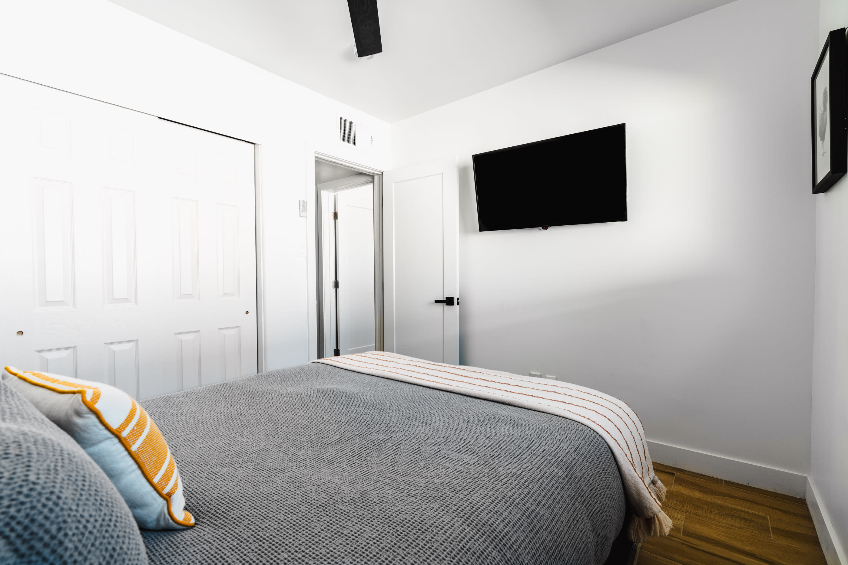 Queen bedroom 2 with closet and smart TV: Chair lays out into child's bed