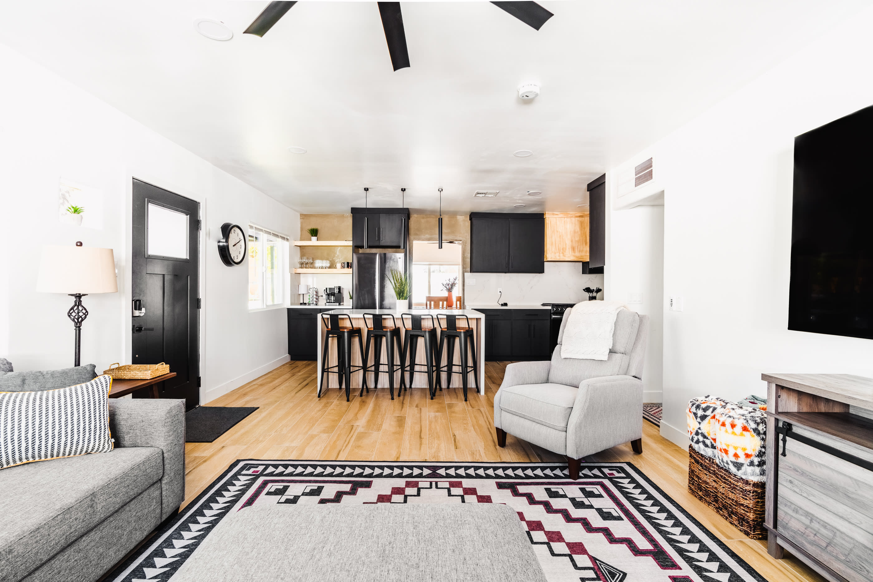 Spacious living room and fully stocked kitchen