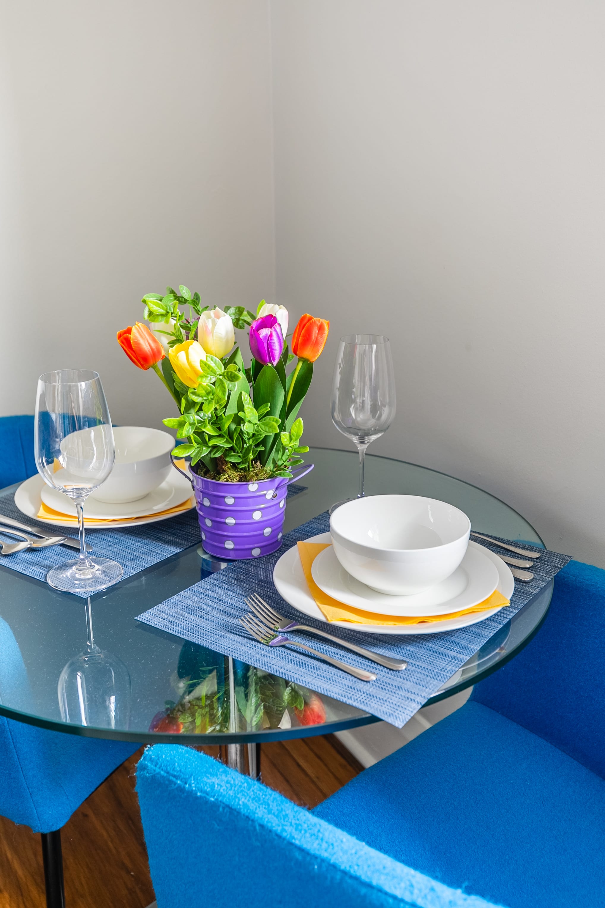 Vibrant Dining Setup With Tulip Centerpiece