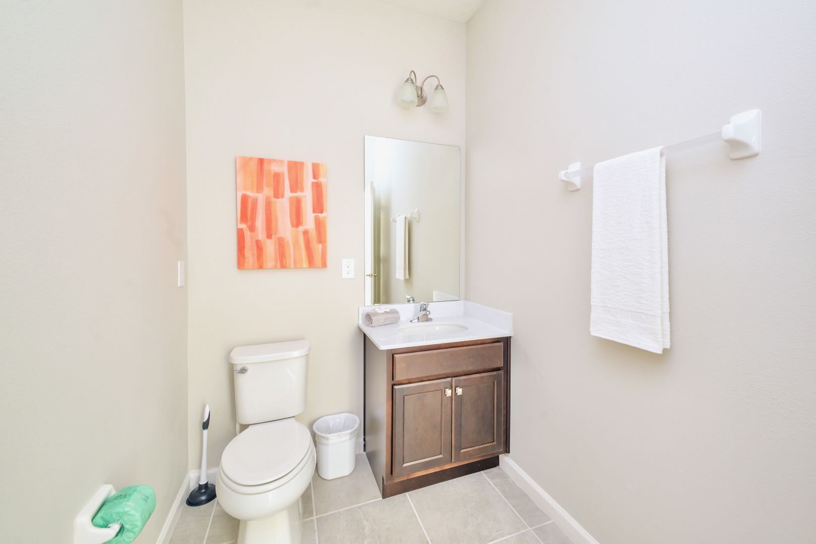 Bright Bathroom With Polished Vanity And Minimalist Finishes