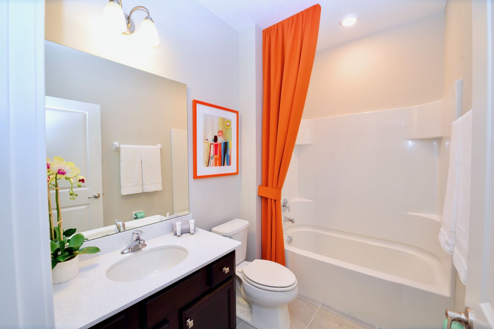 Bright Bathroom With Elegant Vanity And Artistic Details