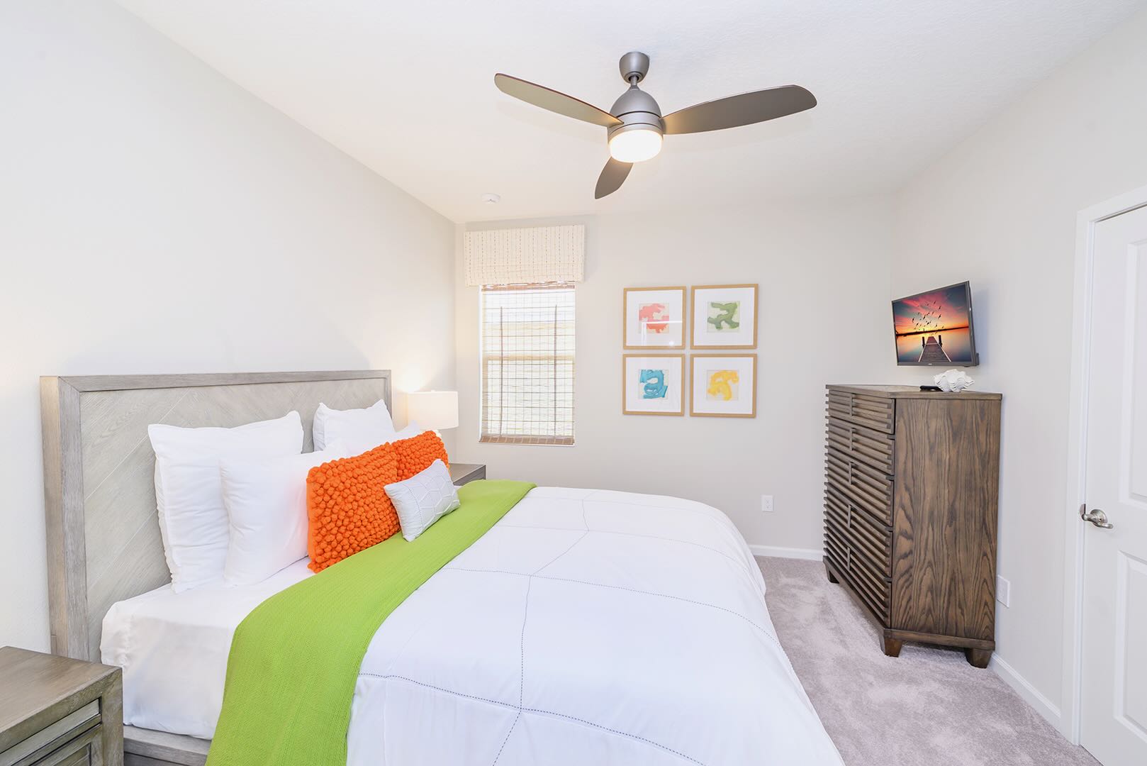 Bedroom With Vibrant Green Accents And Comfortable Bedding