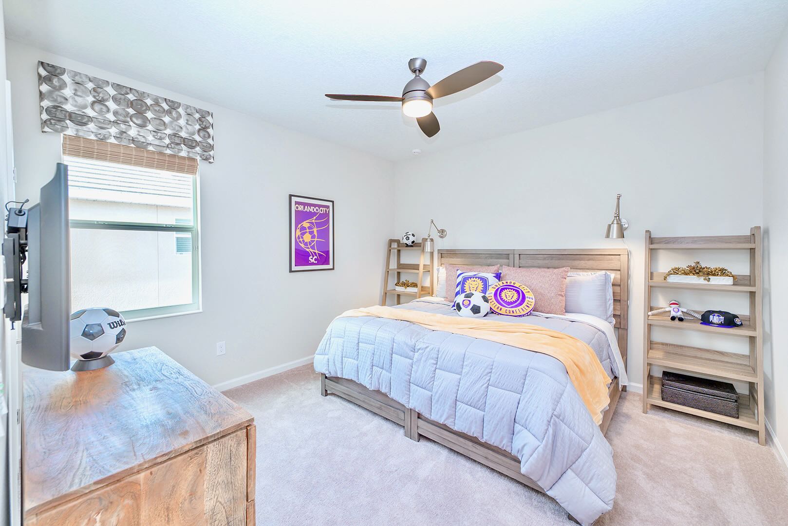 Modern Bedroom With Sleek Furniture And Large Smart TV