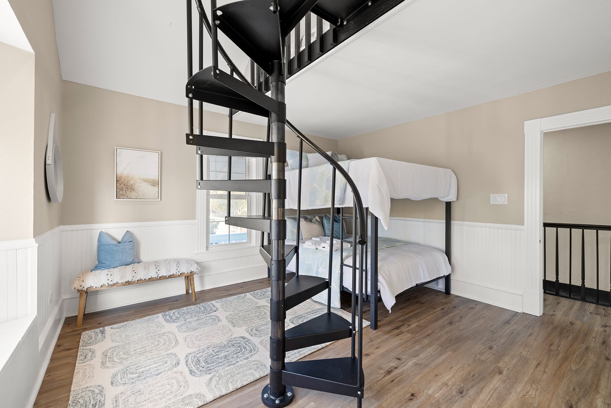 Full/Full bunk bed with spiral staircase to a loft with two twin beds!