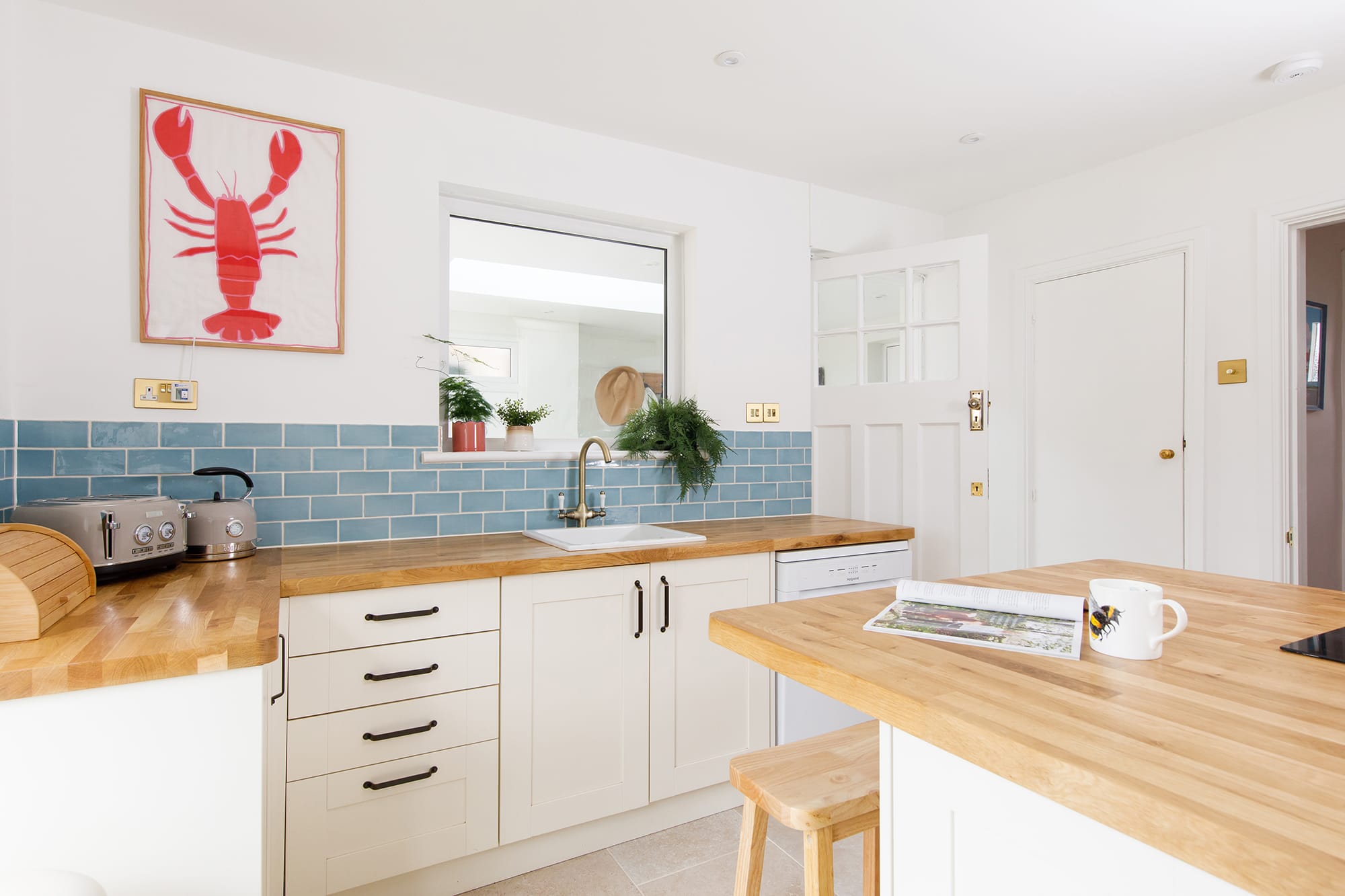 Our light and airy Kitchen is newly refrurbished and has views over the garden