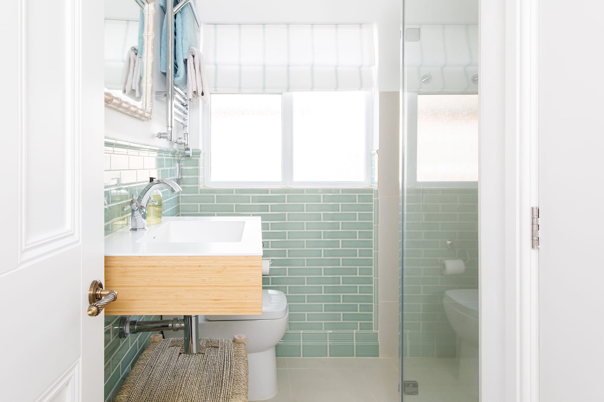 The bathoom has a large walk-in shower, sink and WC.