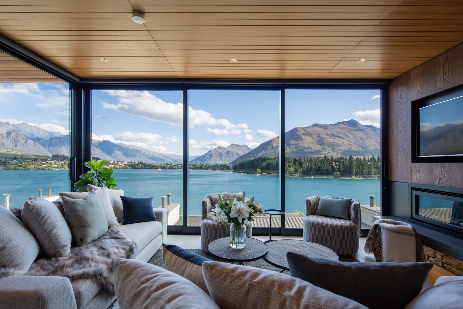 Beautiful lounge area with stunning views over the lake and mountains
