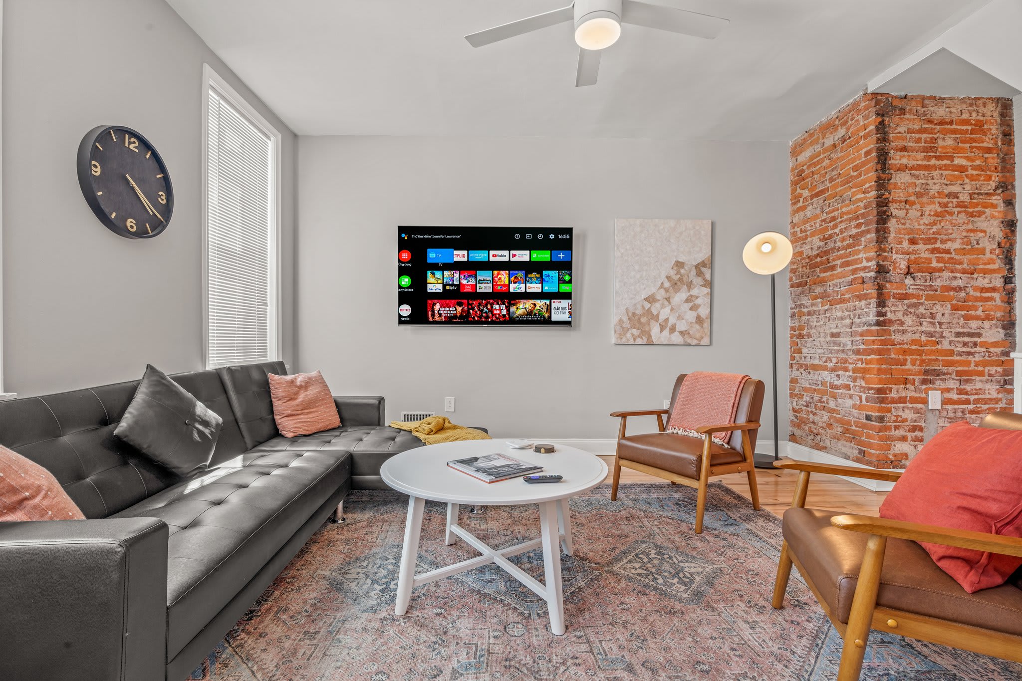 Spacious & bright living room with smartTV. Featuring a sofa bed and smart TV