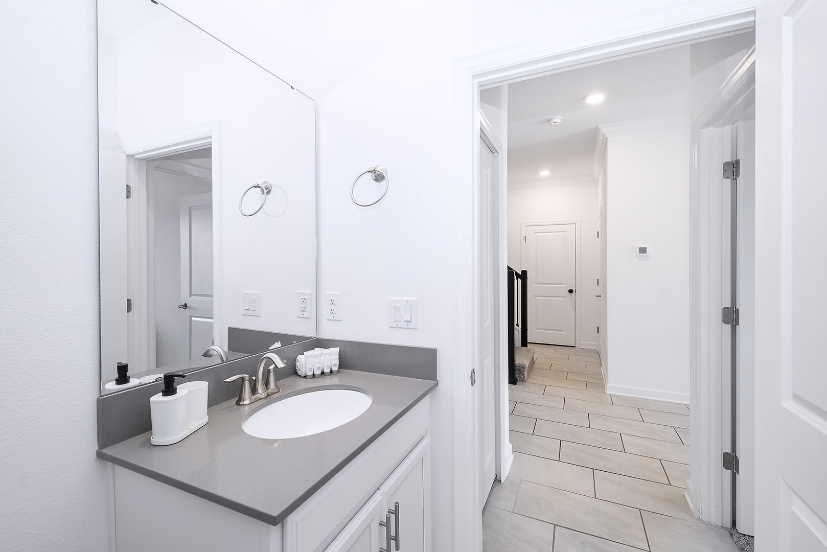 Minimalist Bathroom With Functional Design And Ample Lighting