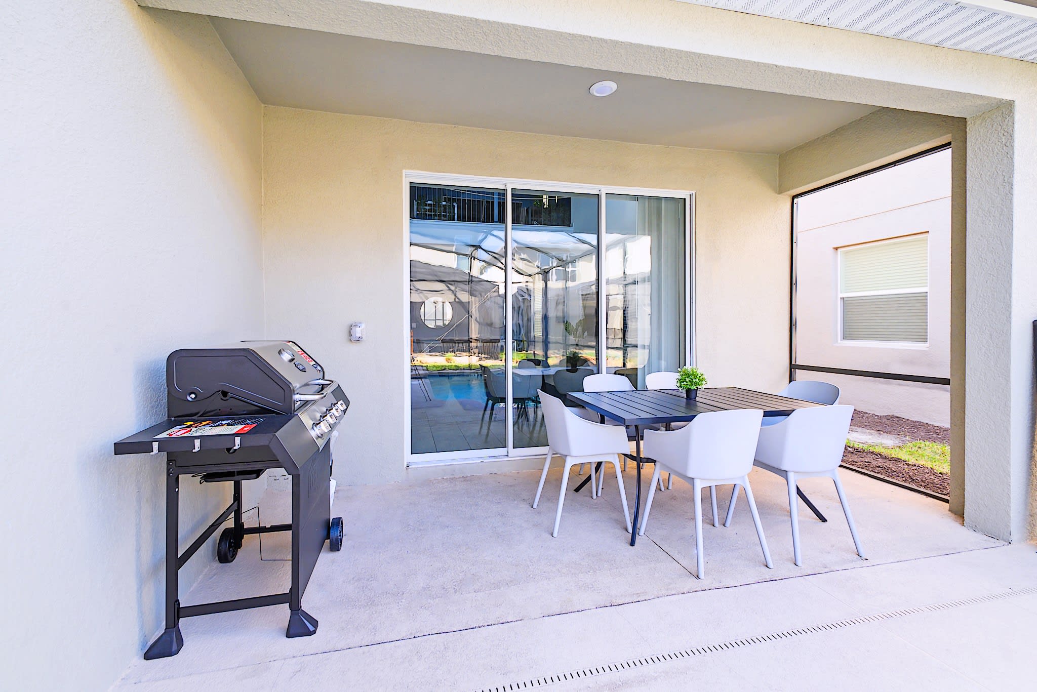 Outdoor dining area and BBQ grill