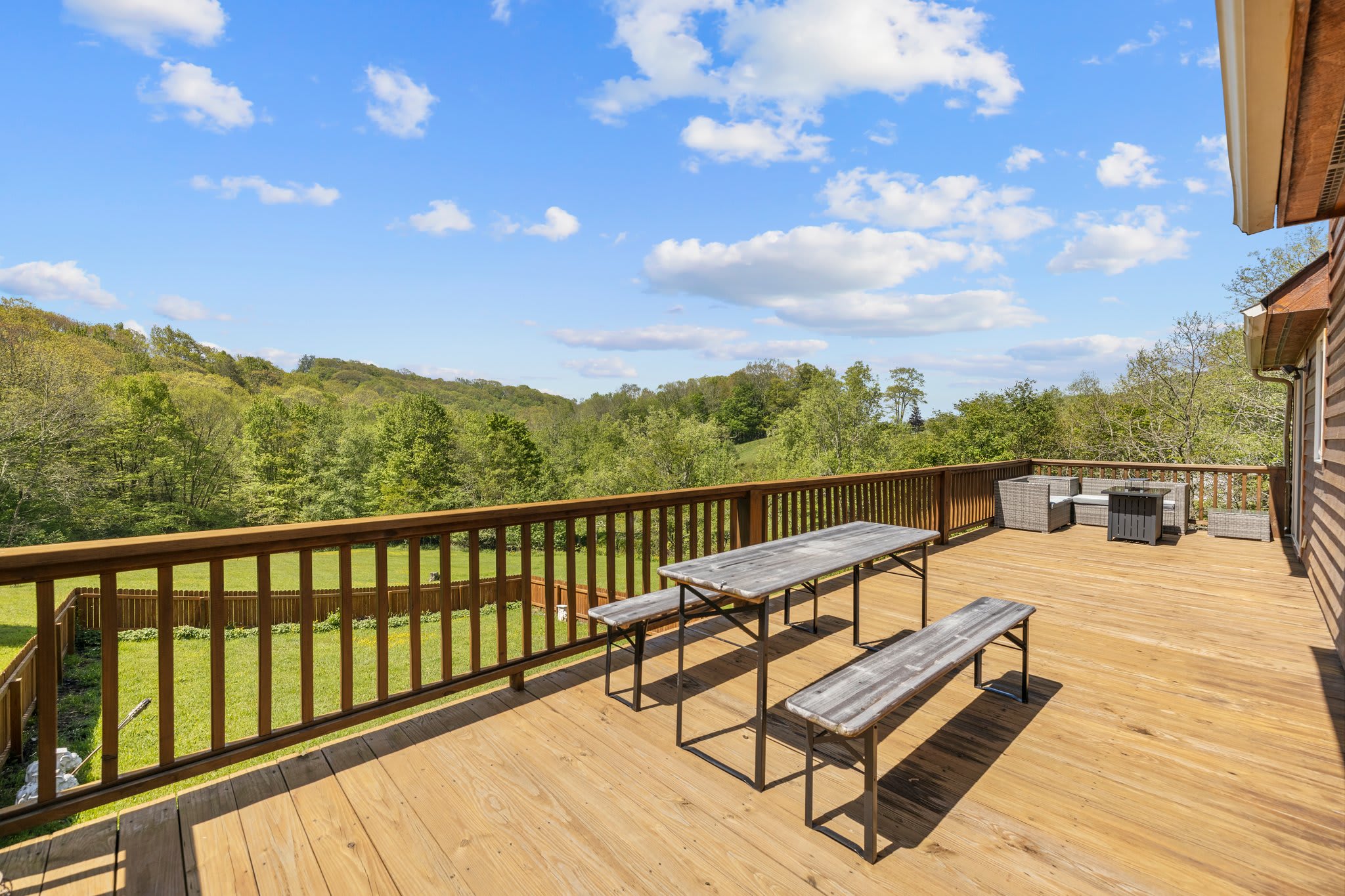 This back deck is the spot to take some deep breaths and disconnect while the dogs enjoy the fenced in backyard.