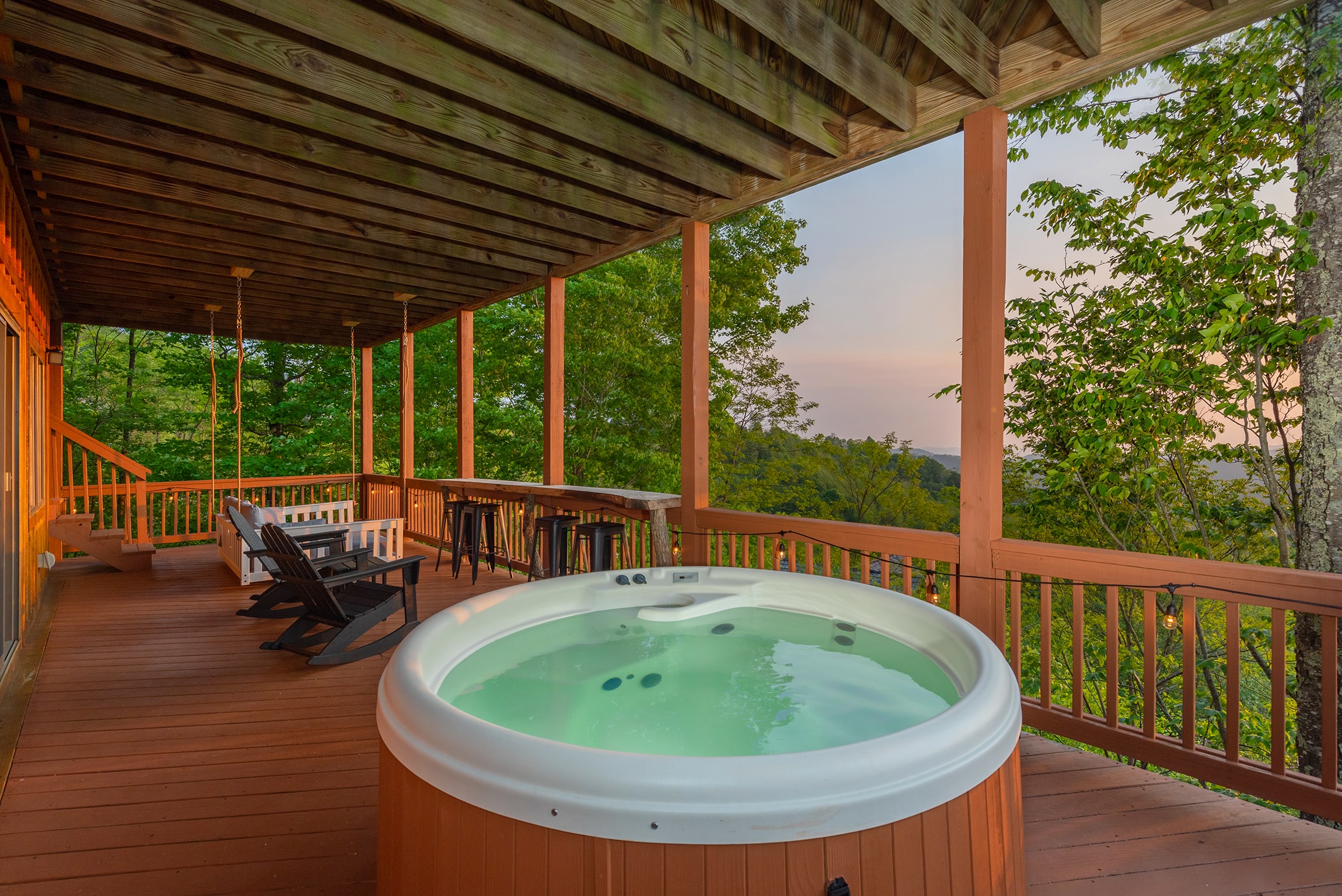 Cabin 2 - soak up the views in the hot tub on the lower deck!
