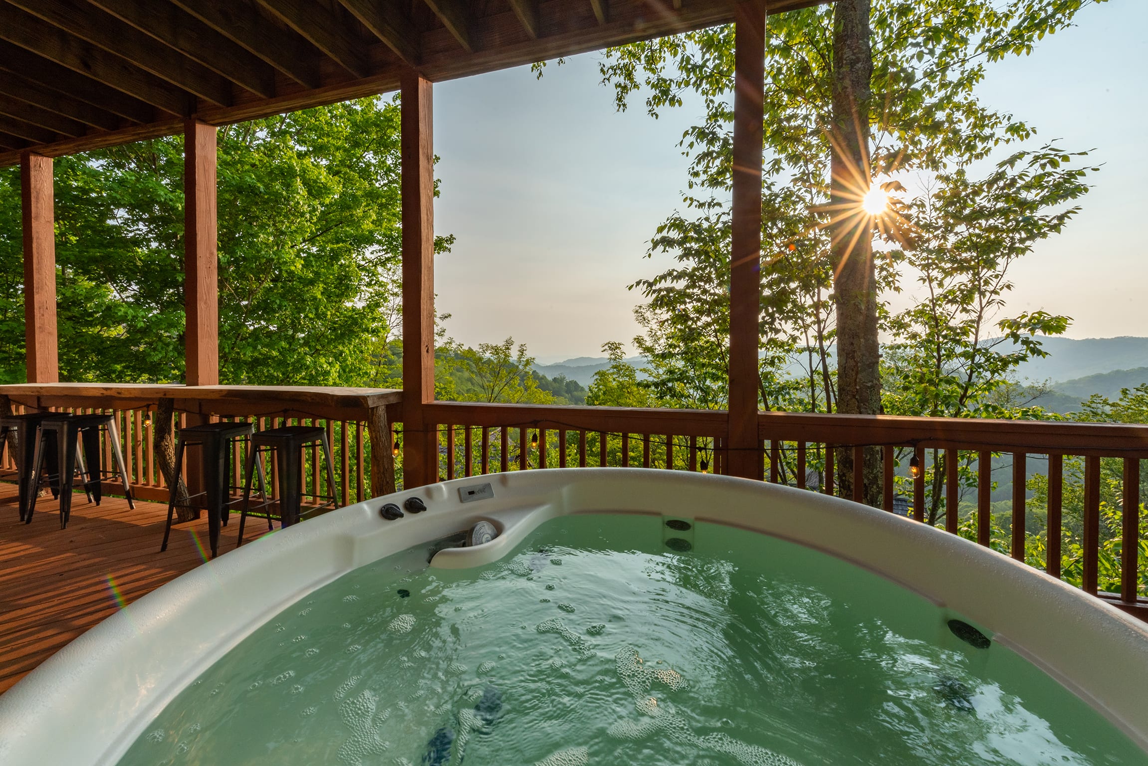 Cabin 2 - soak up the views in the hot tub on the lower deck!
