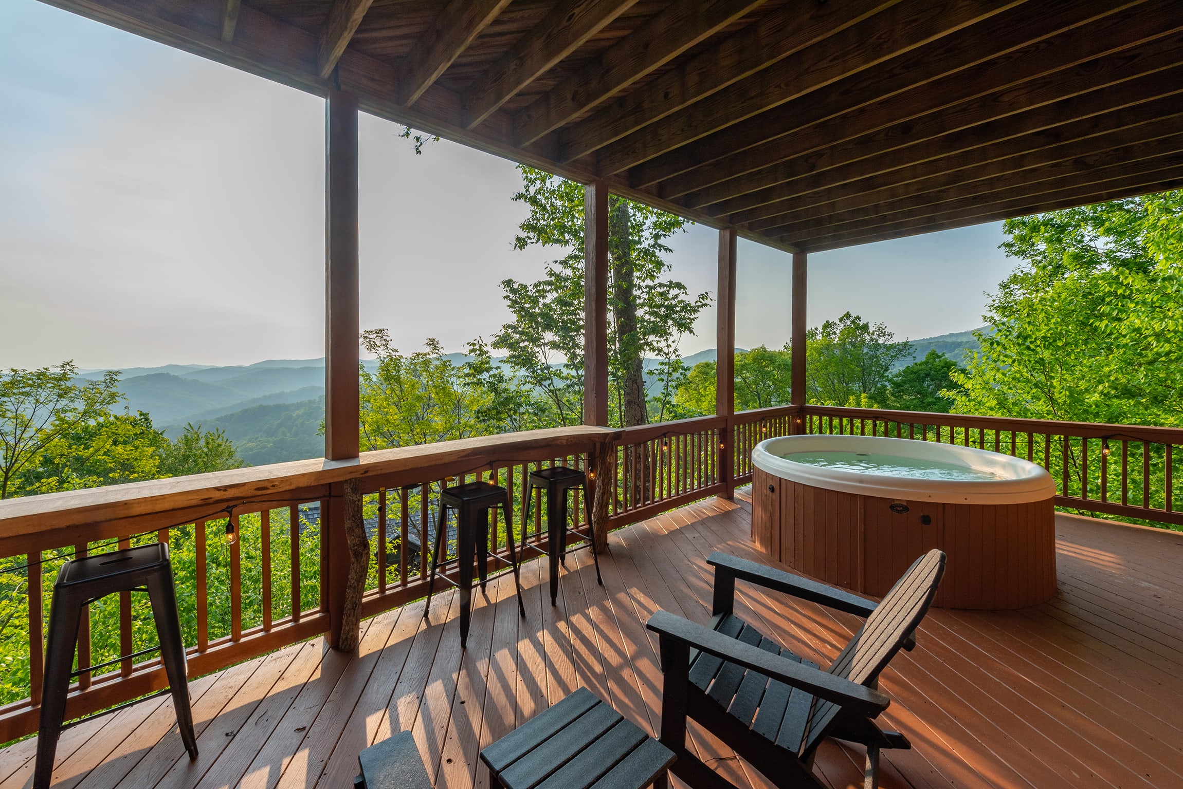 Cabin 2 - soak up the views in the hot tub on the lower deck!