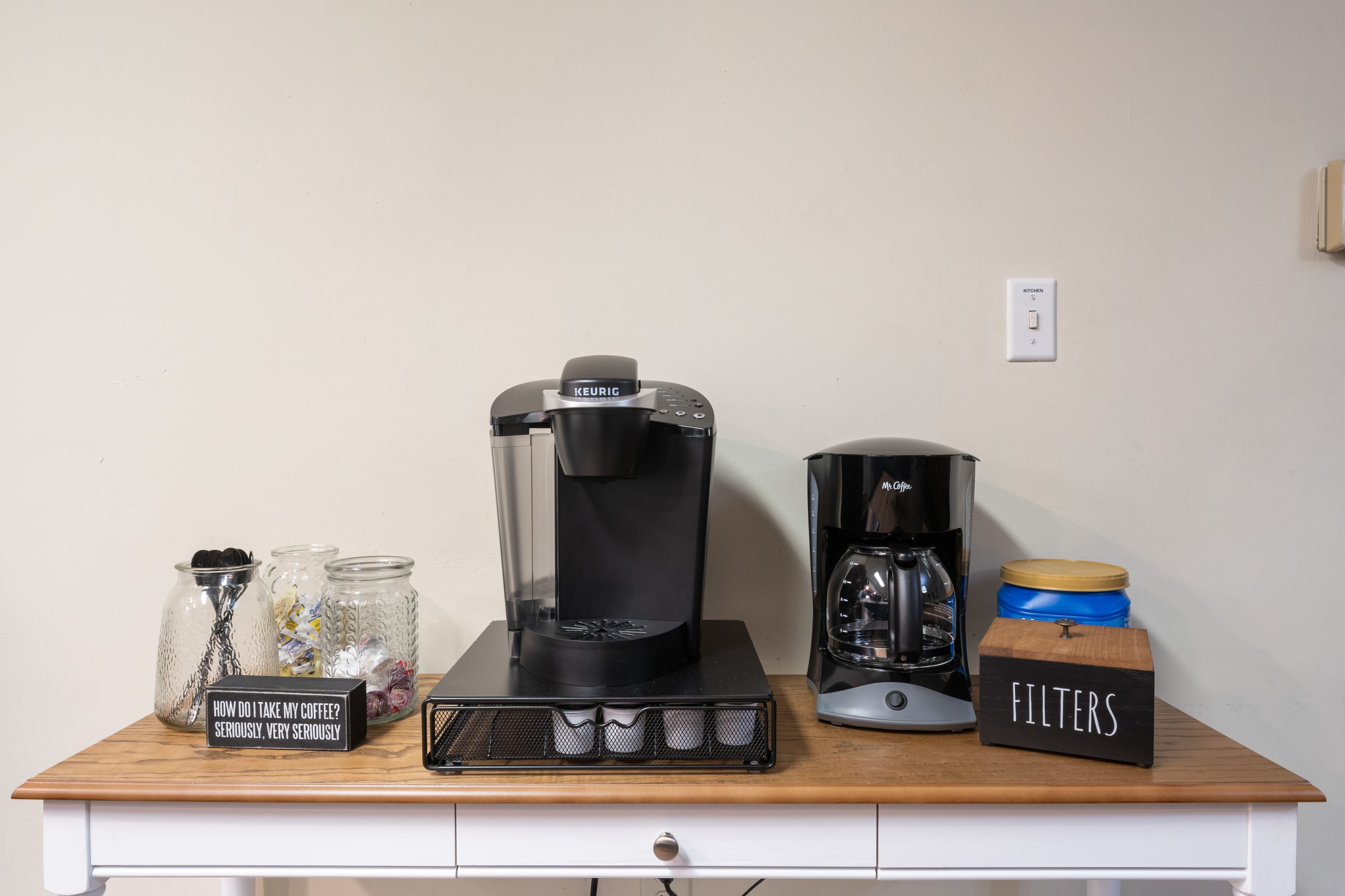 Fully Stocked Coffee Bar: Grounds, K cups, sugar and creamer all provided!