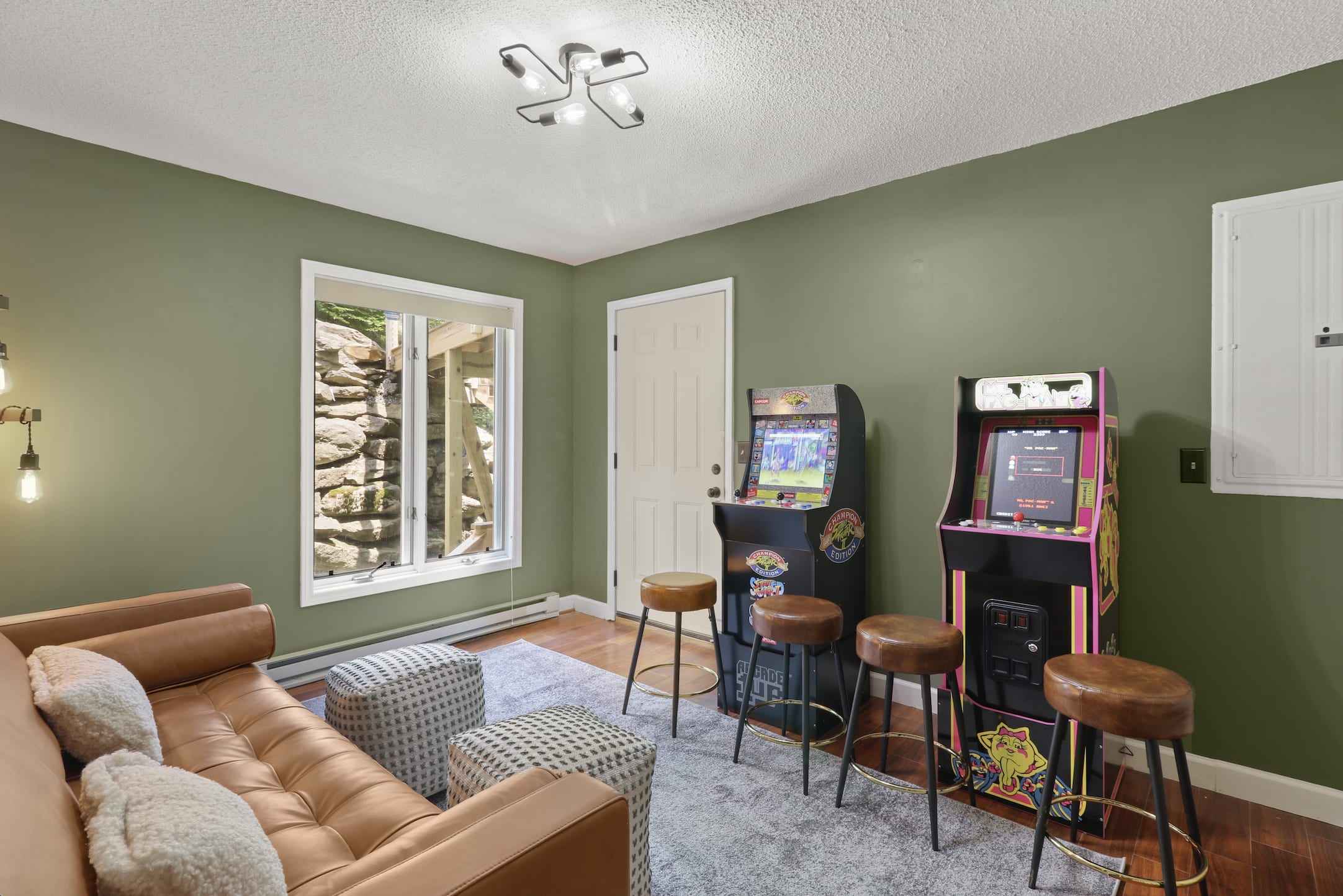 The Game Area- Pac Man and fighting game! This room also has a Queen pull out couch