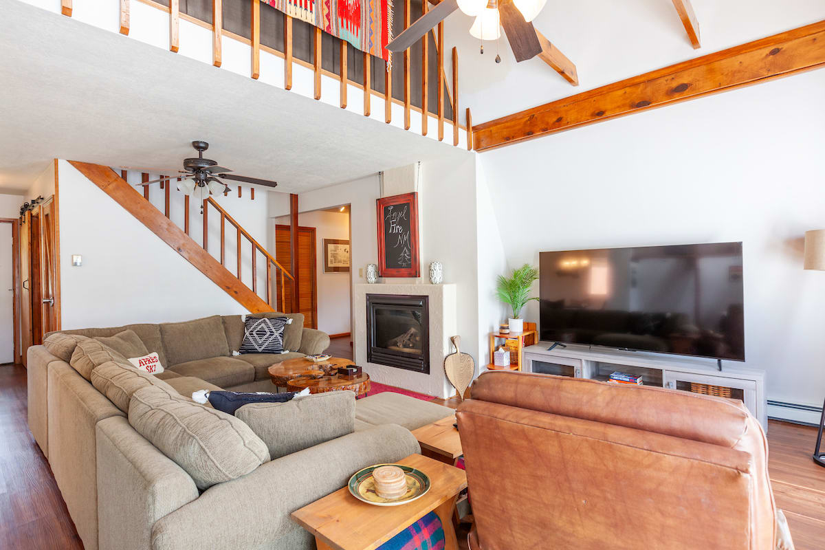Welcome to the perfect getaway A Frame in Angel Fire. With 3BRs the property sleeps up to 8 and has awesome views of the Rocky Mountains. Enjoy this large, comfy sectional for movie night after a long day golfing, skiing, or hiking!