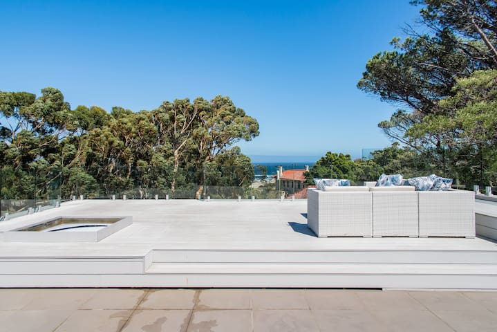 Elegant Villa w Coastal Views Nestled Below Lions Head The Grange